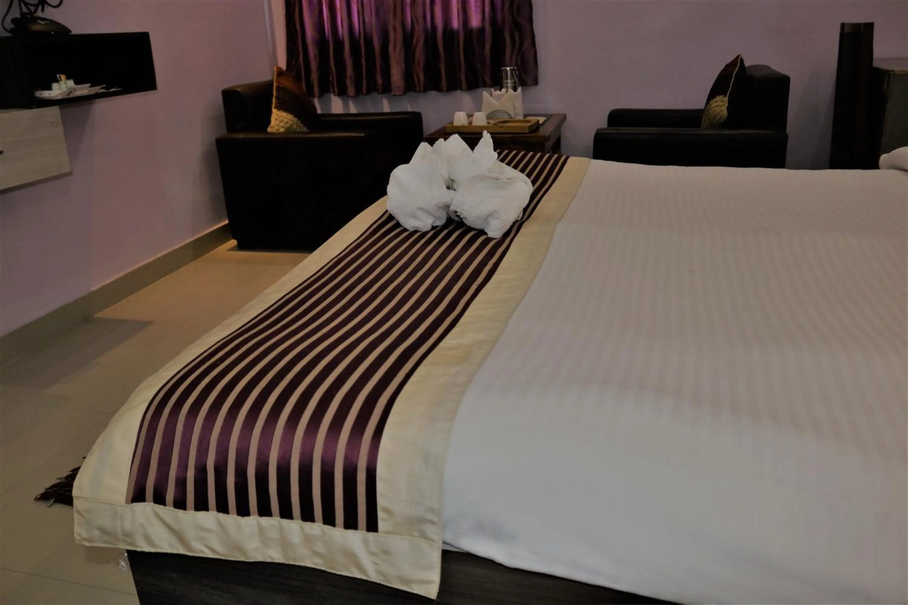 Bed in Hotel Vaishnavi Heights