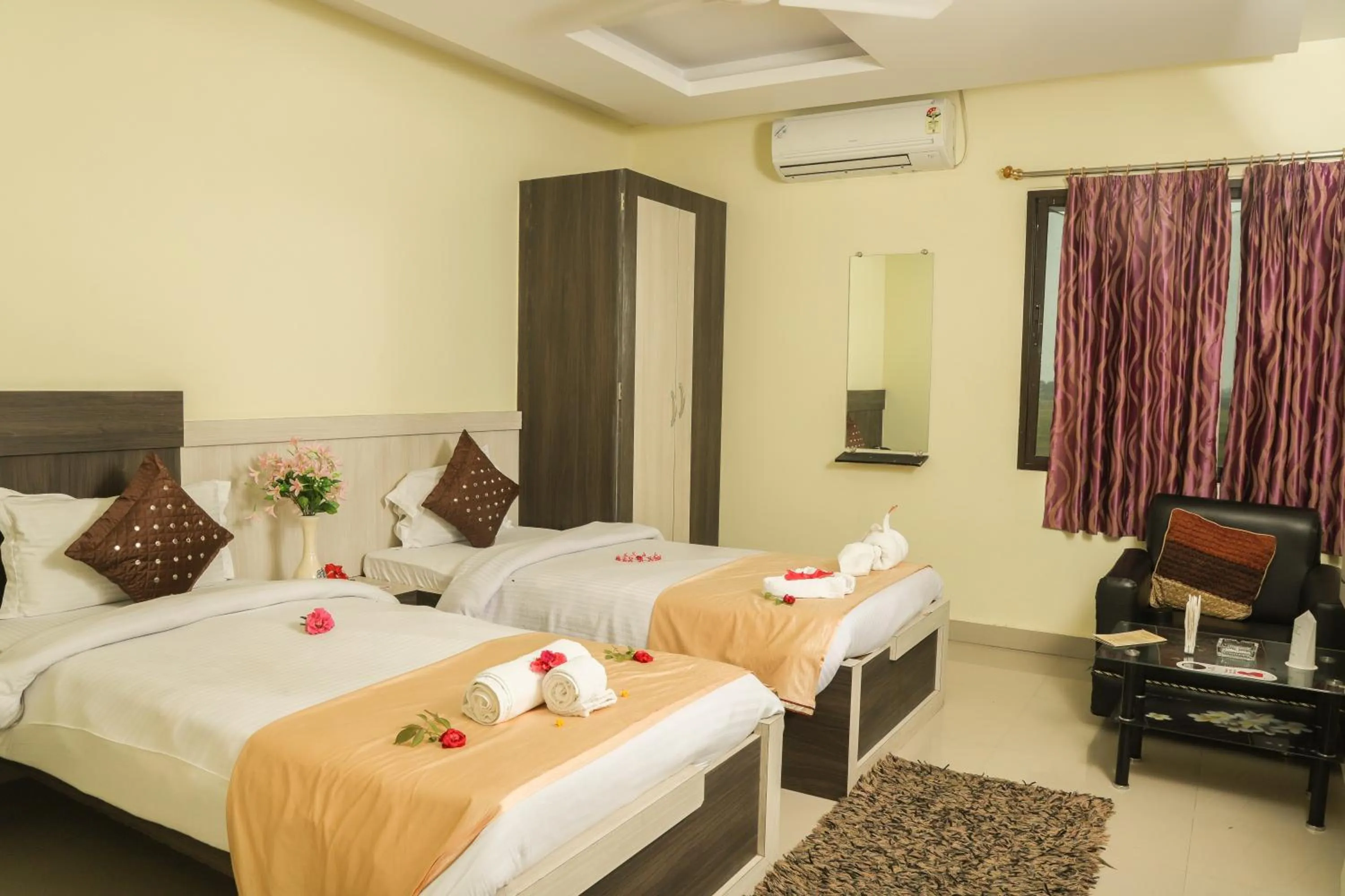 Bed in Hotel Vaishnavi Heights