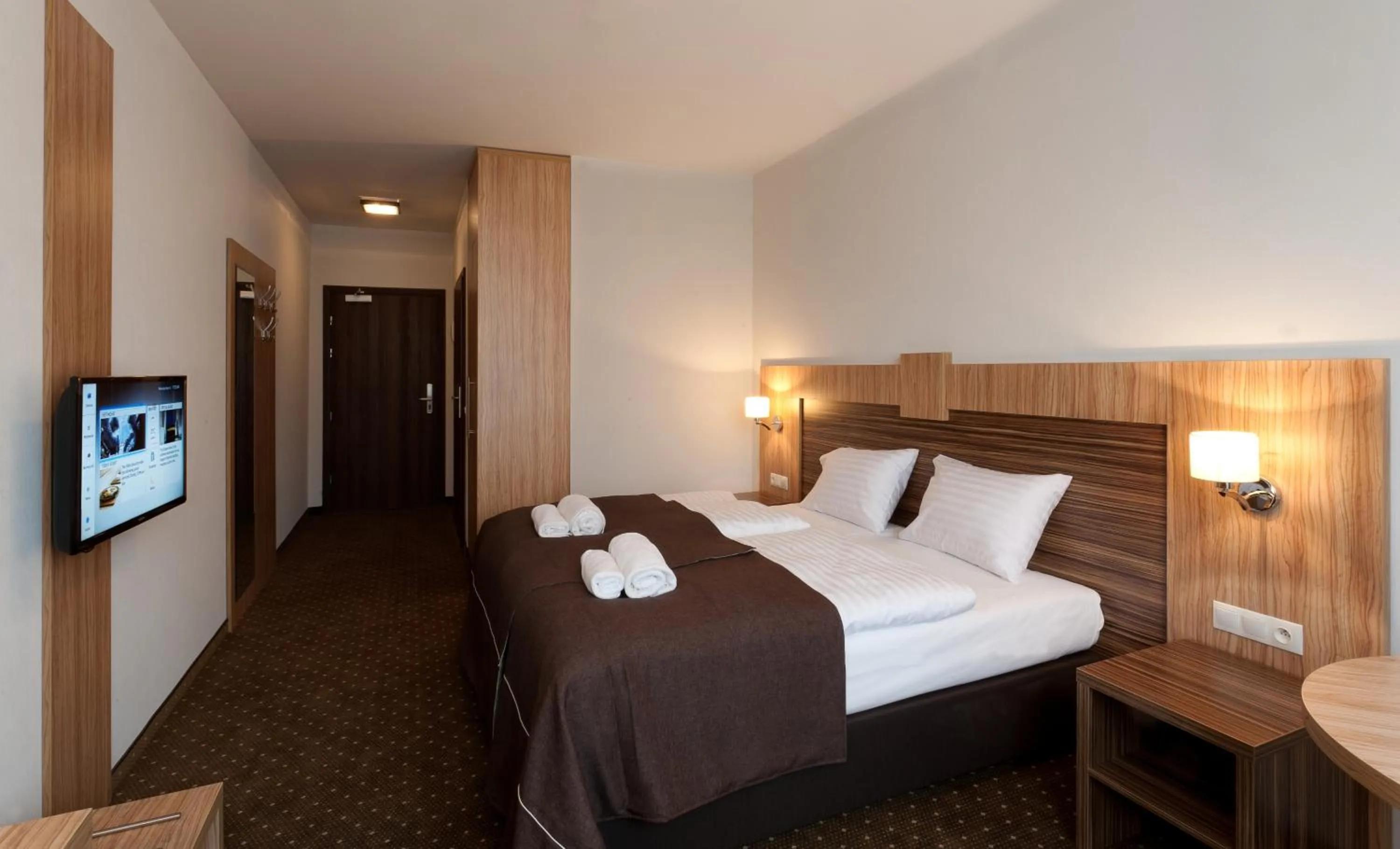 Bed in Hotel Milenium