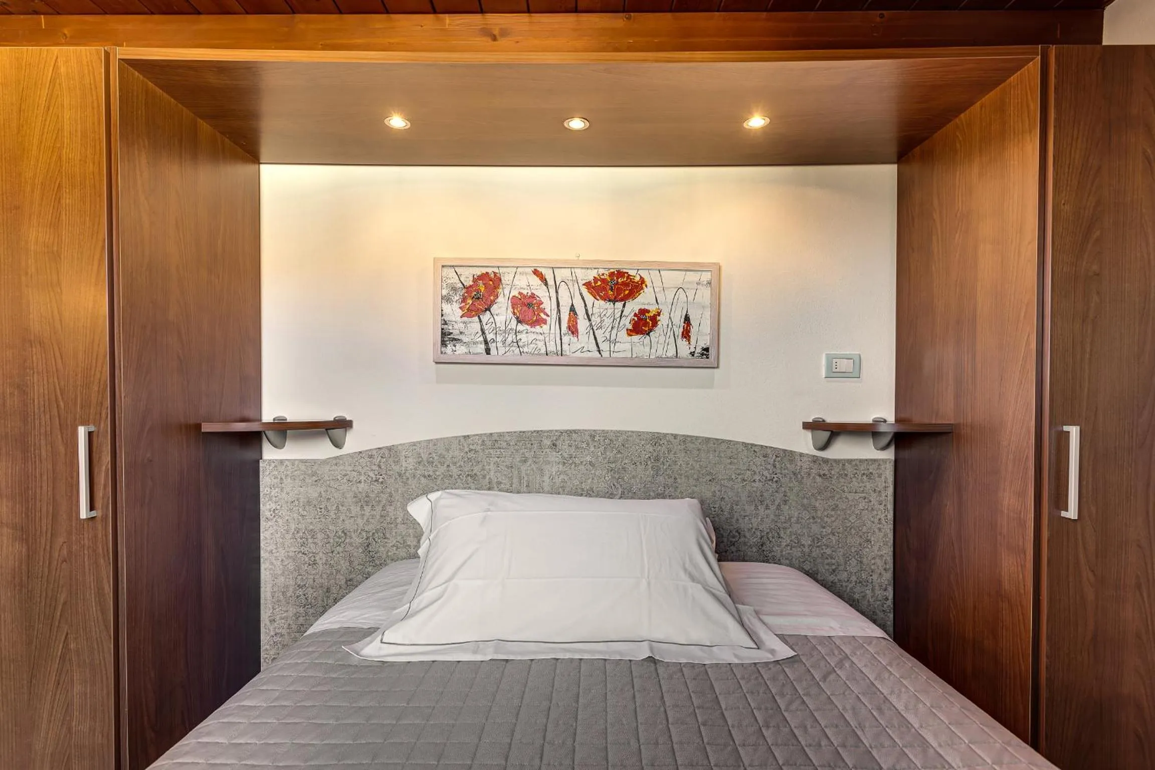 Bed in Hotel Dolcevita