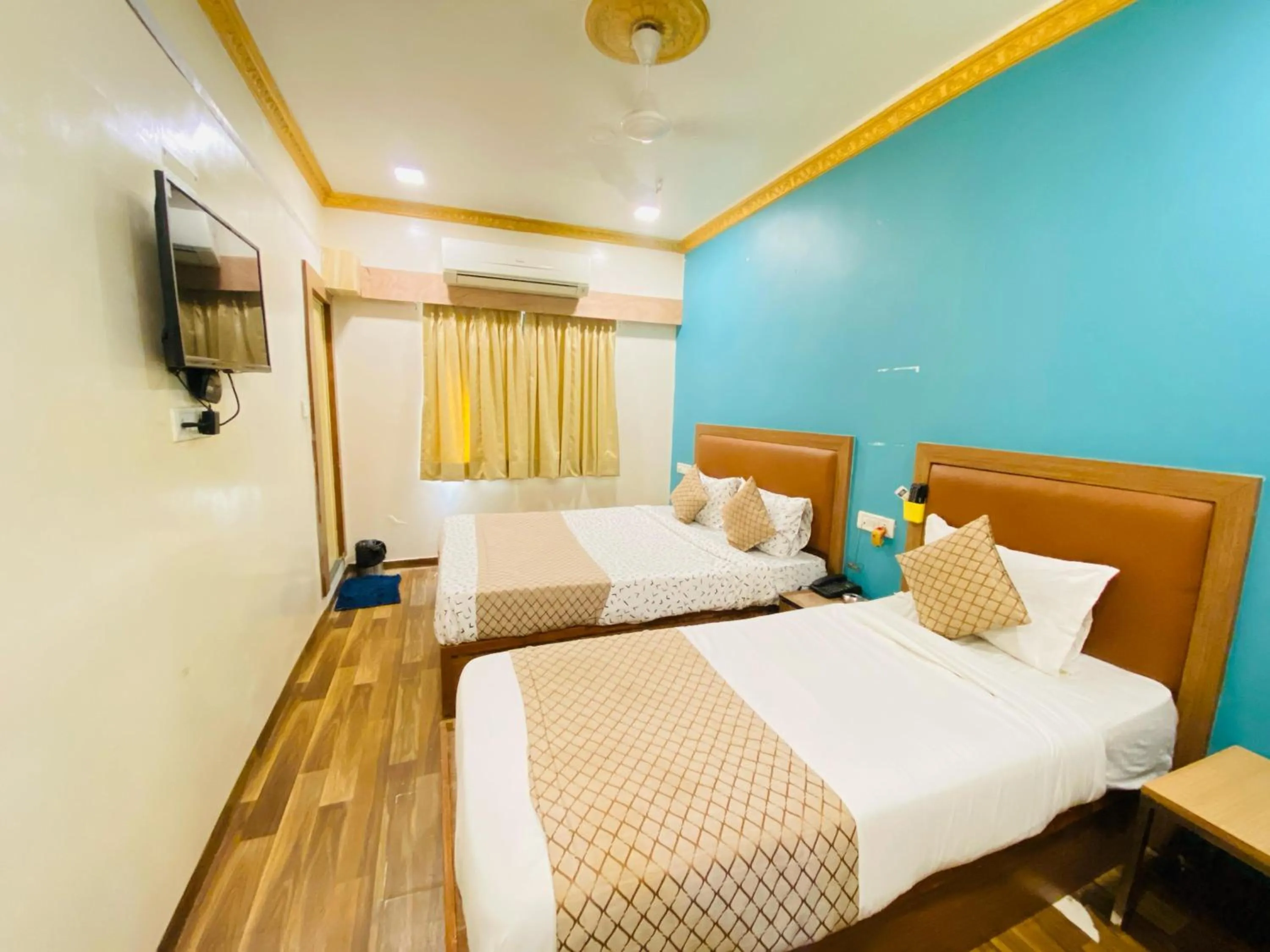 Bed in Hotel ABC Satellite Prahlad Nagar
