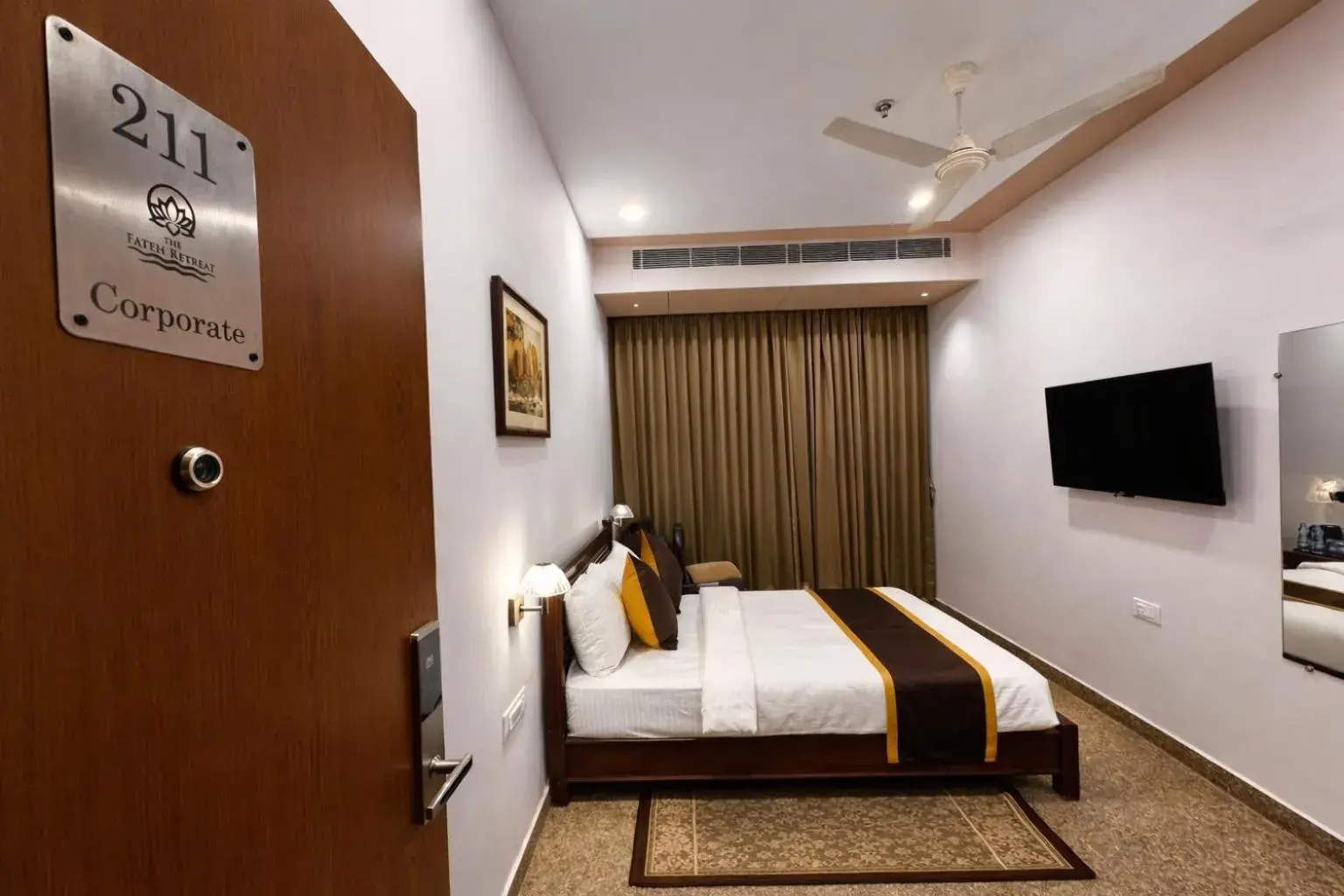 Deluxe Double Room (2 Adults + 1 Child) - single occupancy in Daksh The Fateh Retreat - near to Fateh Sagar Lake Deluxe Double Room (2 Adults + 1 Child) - single occupancy in Daksh The Fateh Retreat - near to Fateh Sagar Lake