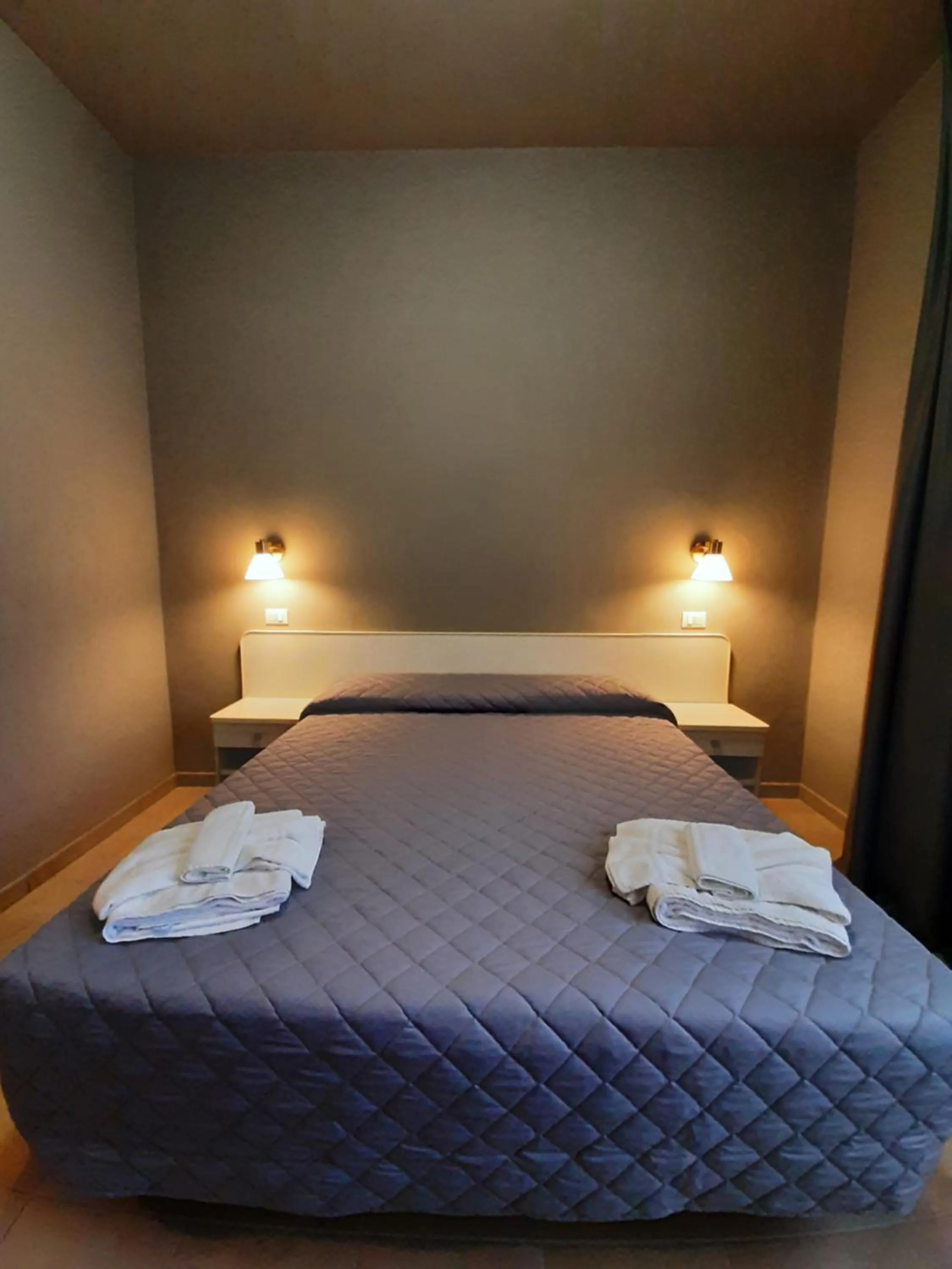 Bed in Hotel Alabama by ALEhotels