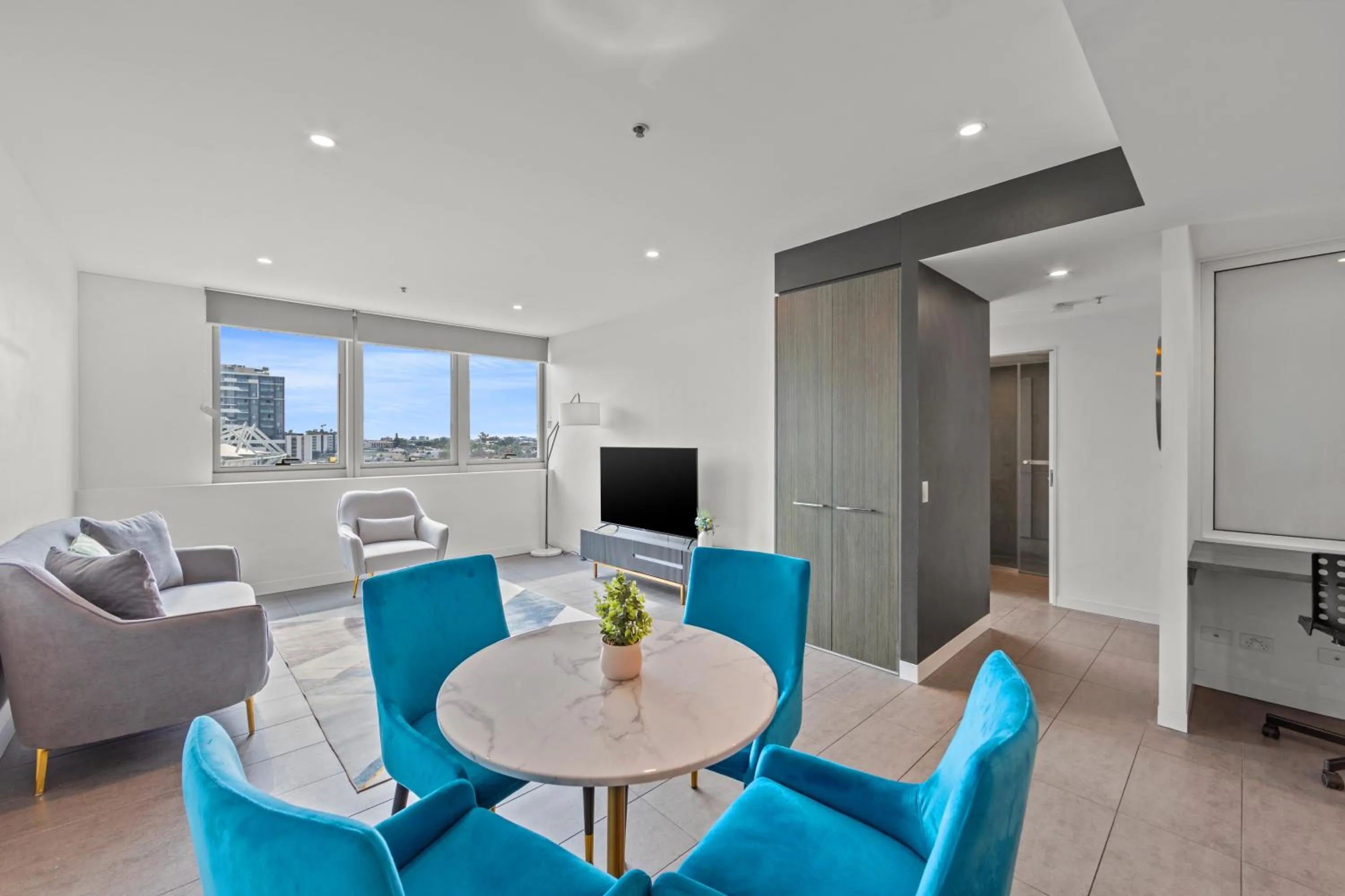 TV and multimedia in Trafalgar Lane Apartments by CLLIX