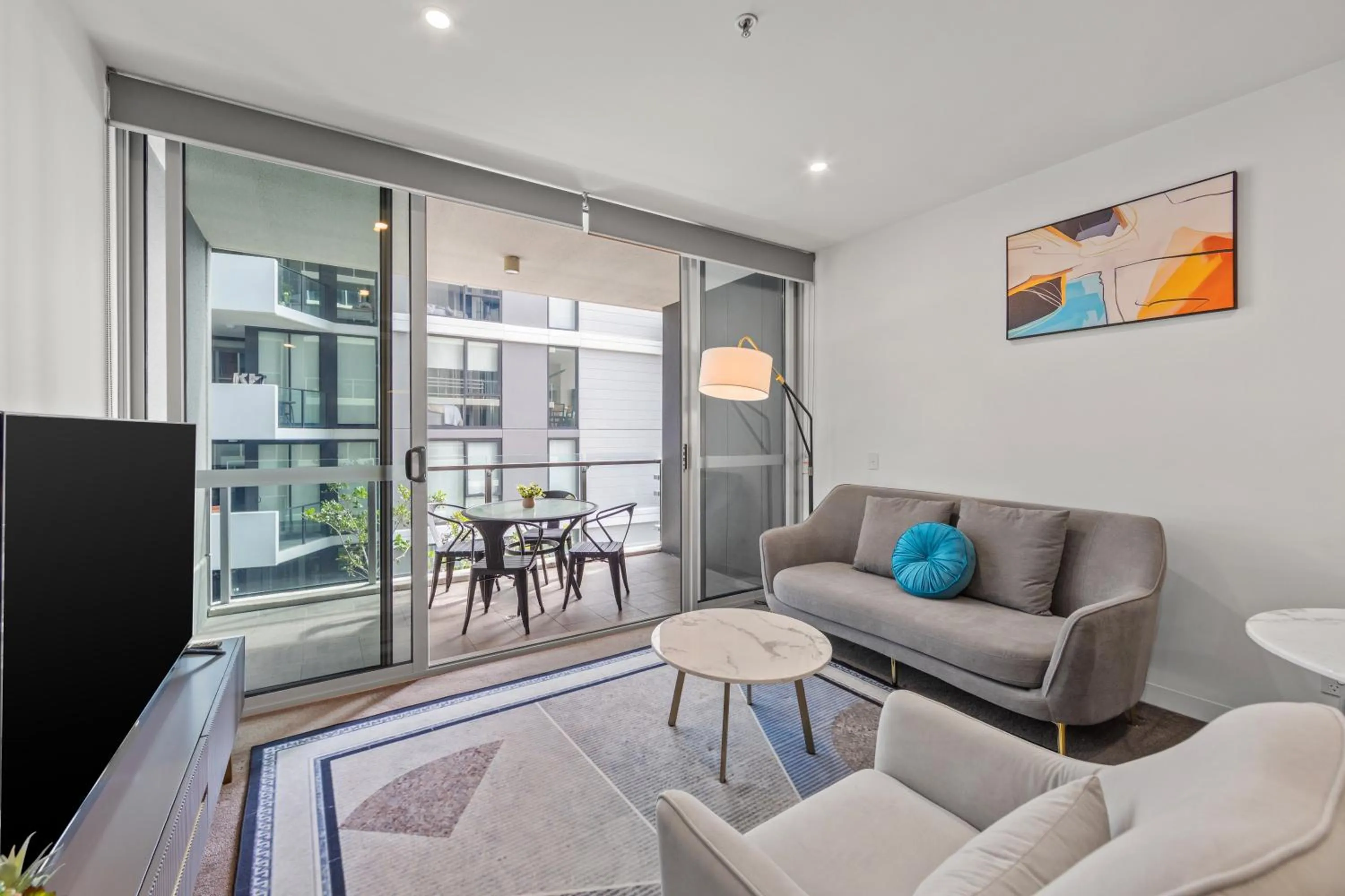 Living room in Trafalgar Lane Apartments by CLLIX