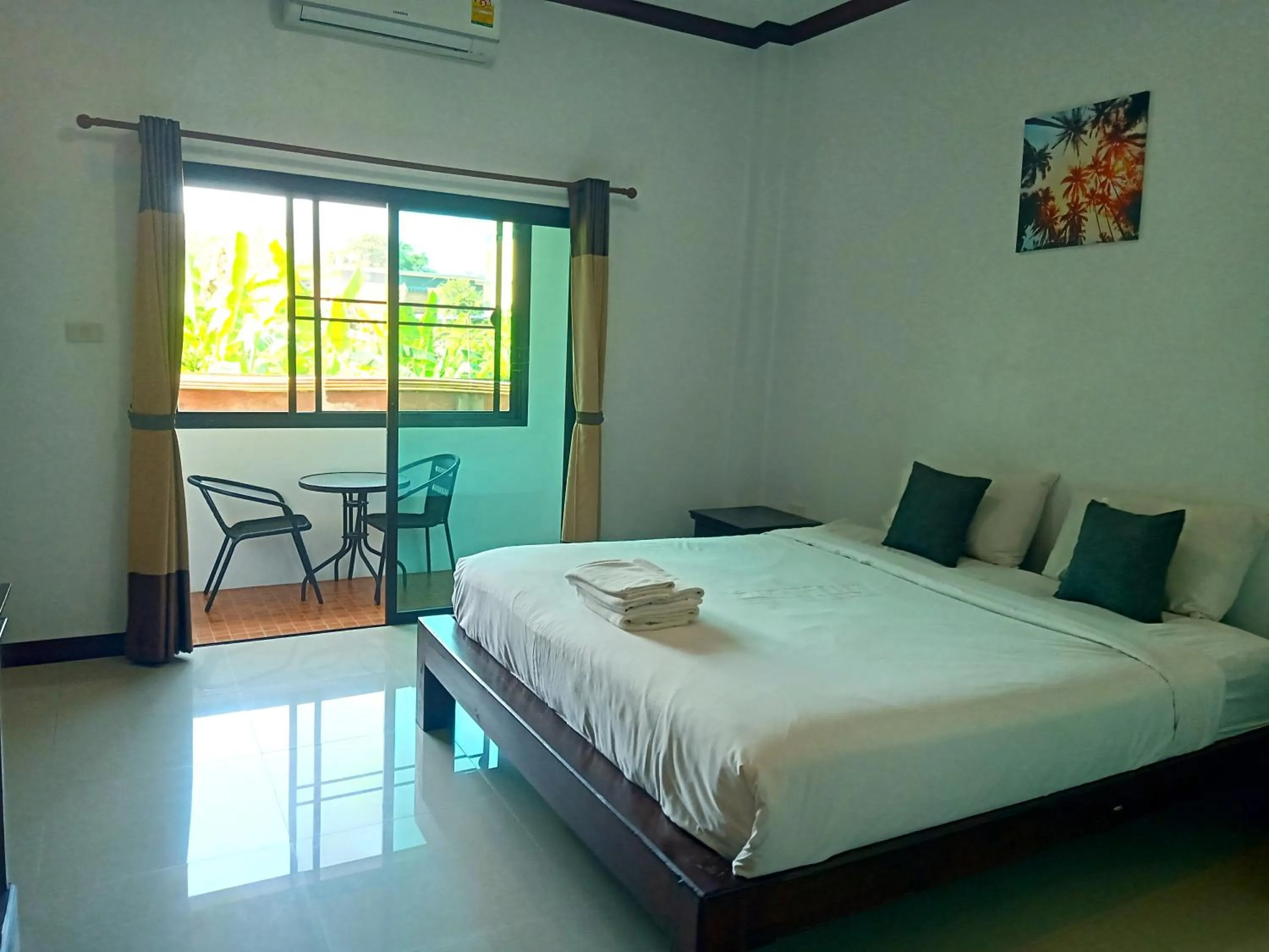 Bed in Be One Boutique Resort