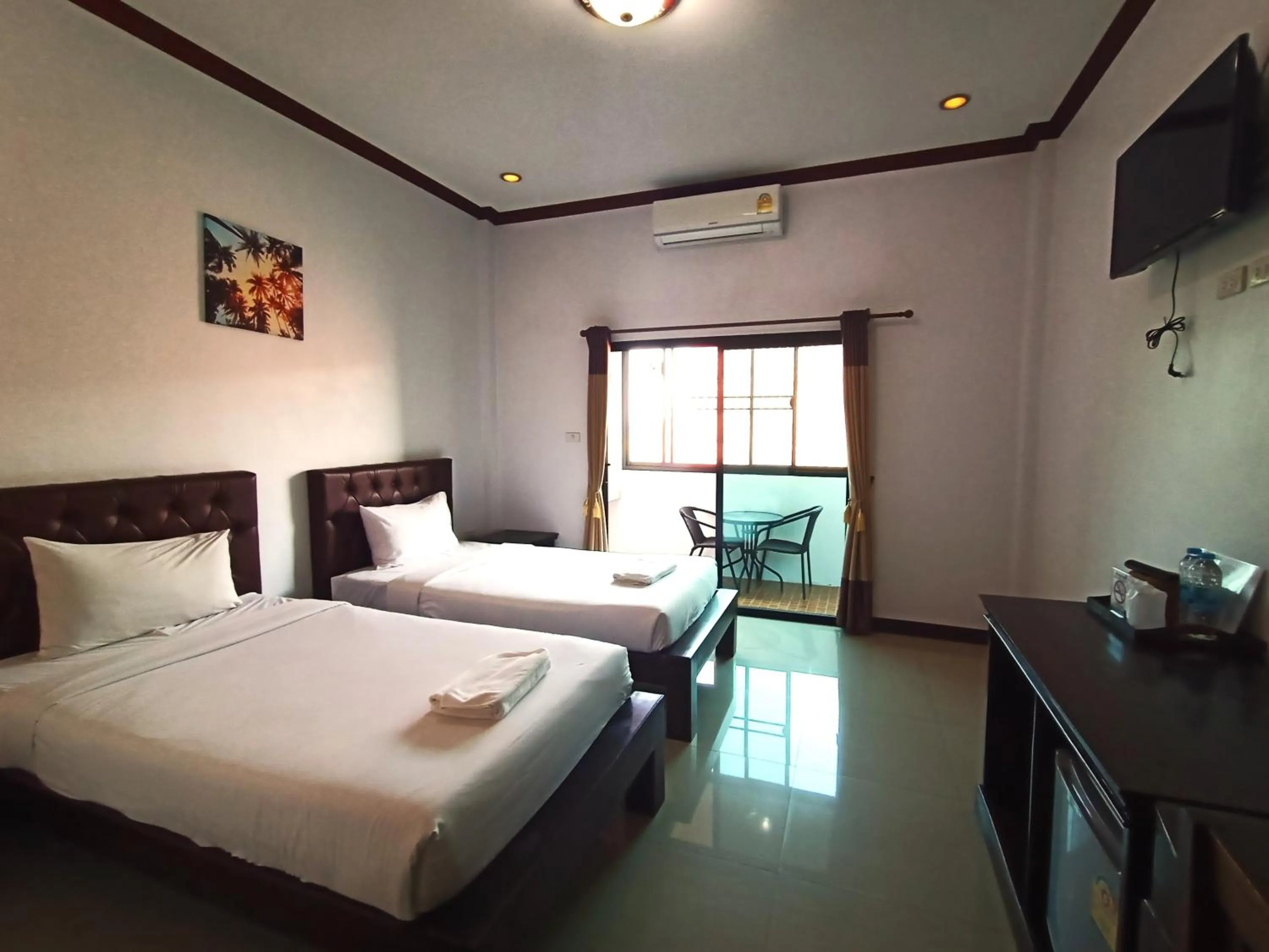 Bed in Be One Boutique Resort