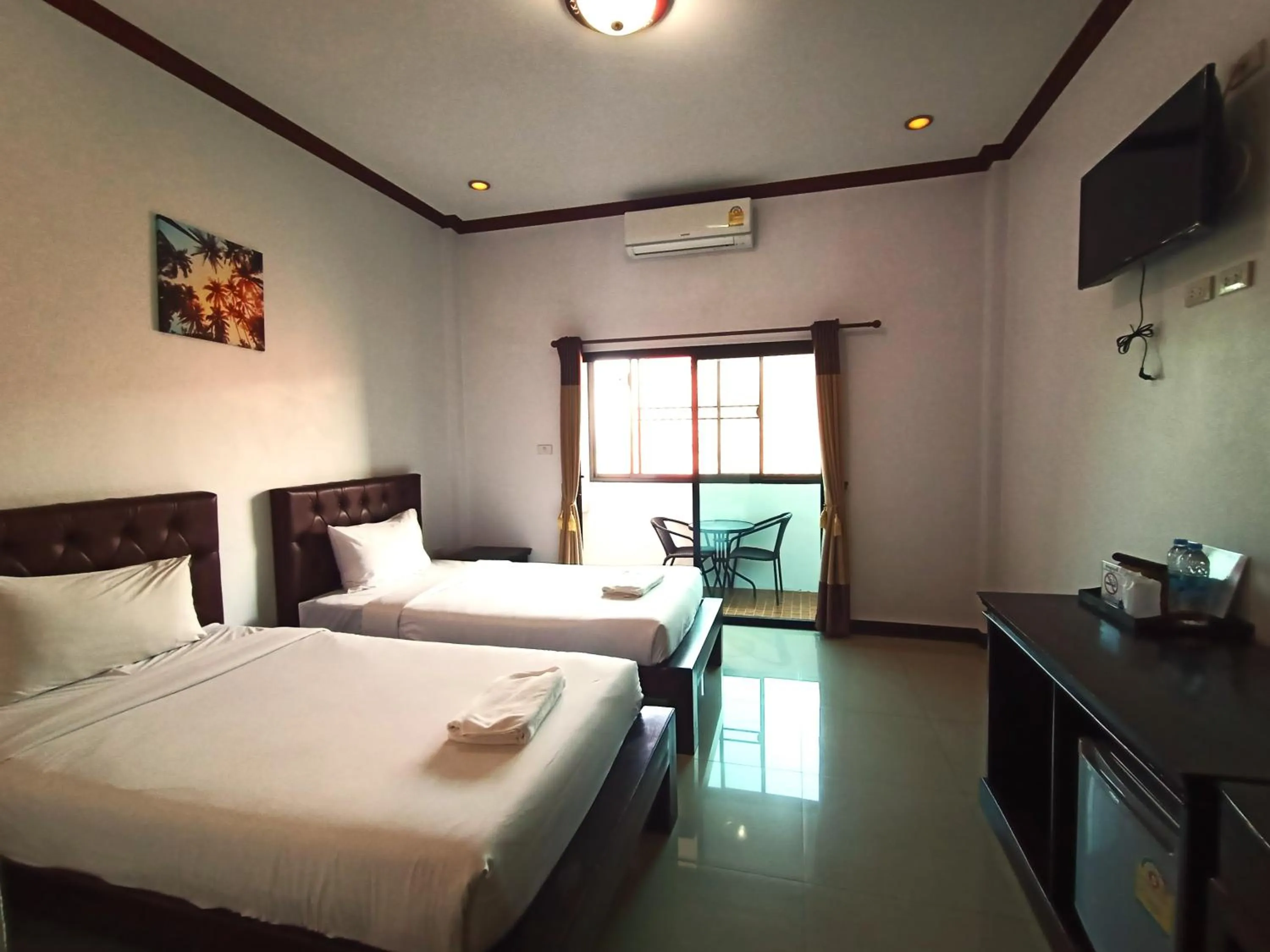 Bed in Be One Boutique Resort