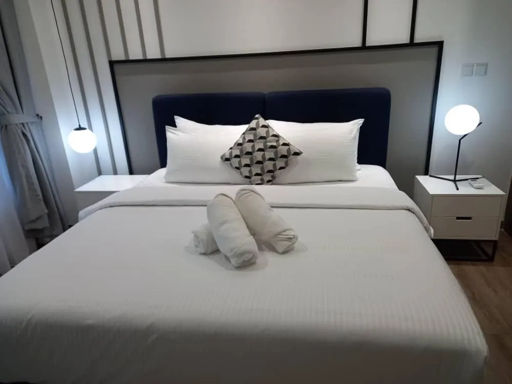 Photo of the whole room, Bed in Agile Suites Kuala Lumpur TRX