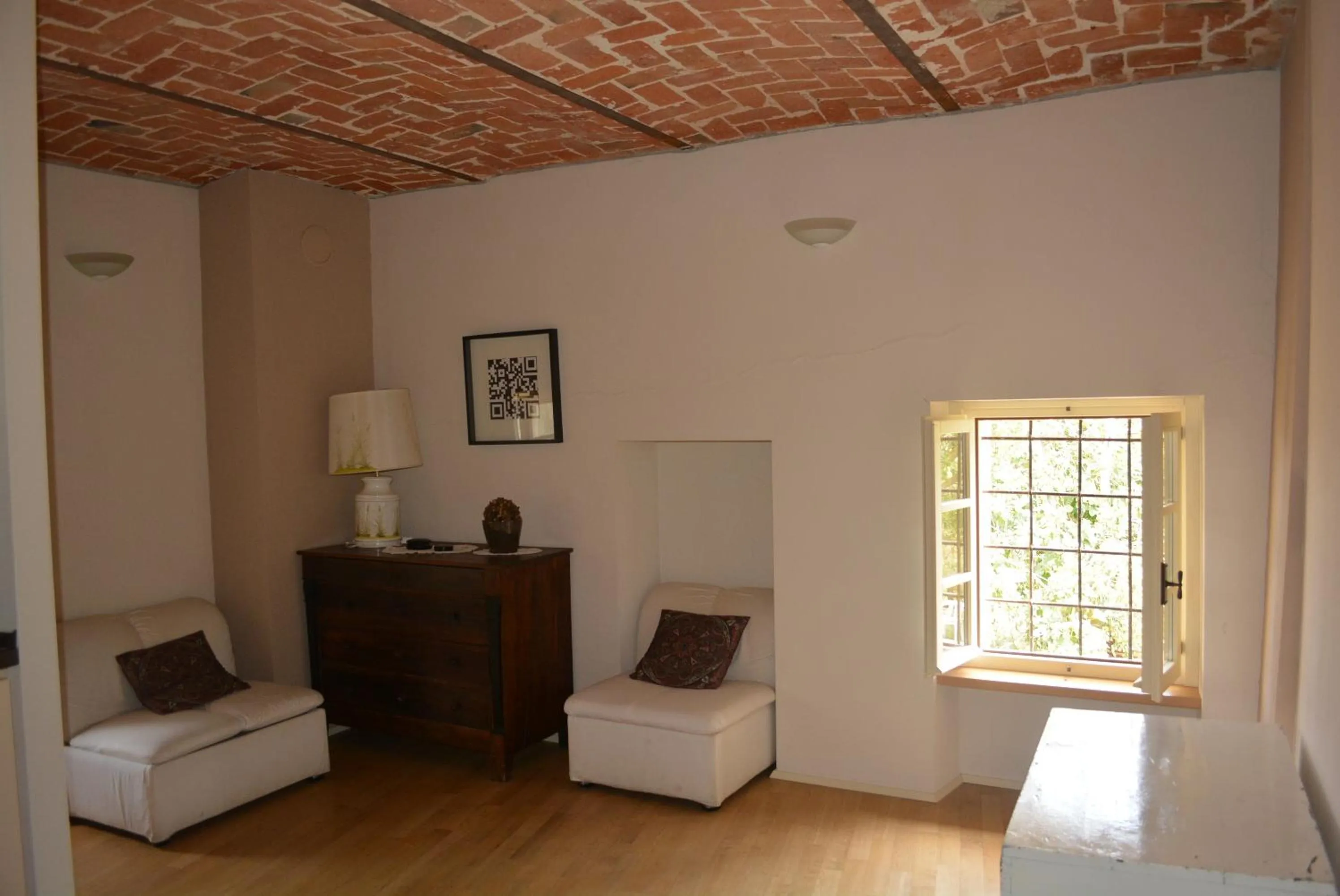 Seating area in Cascina Valtignosa Camere Con Vigna