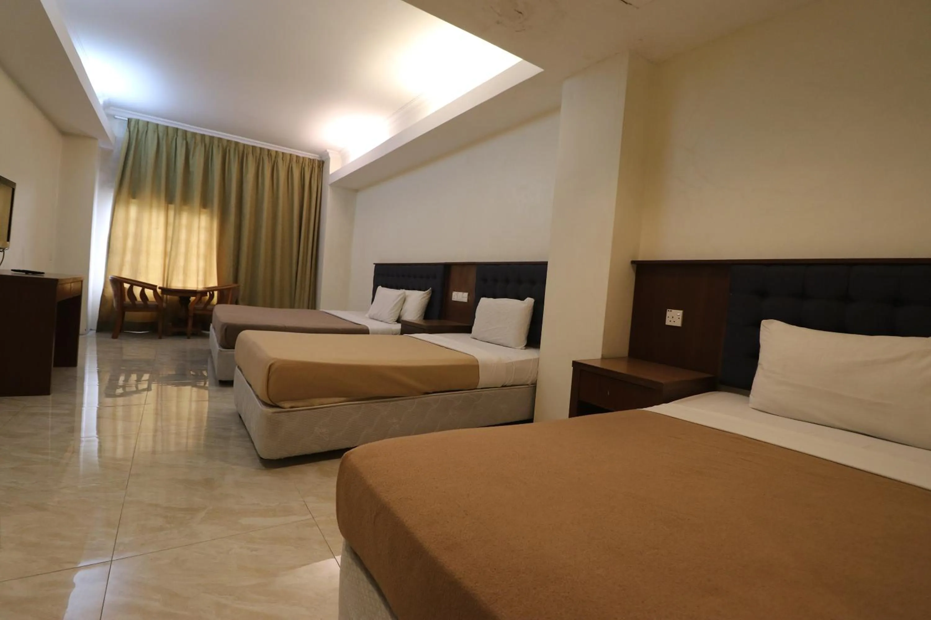 Bed in Iris House Hotel Cameron Highlands