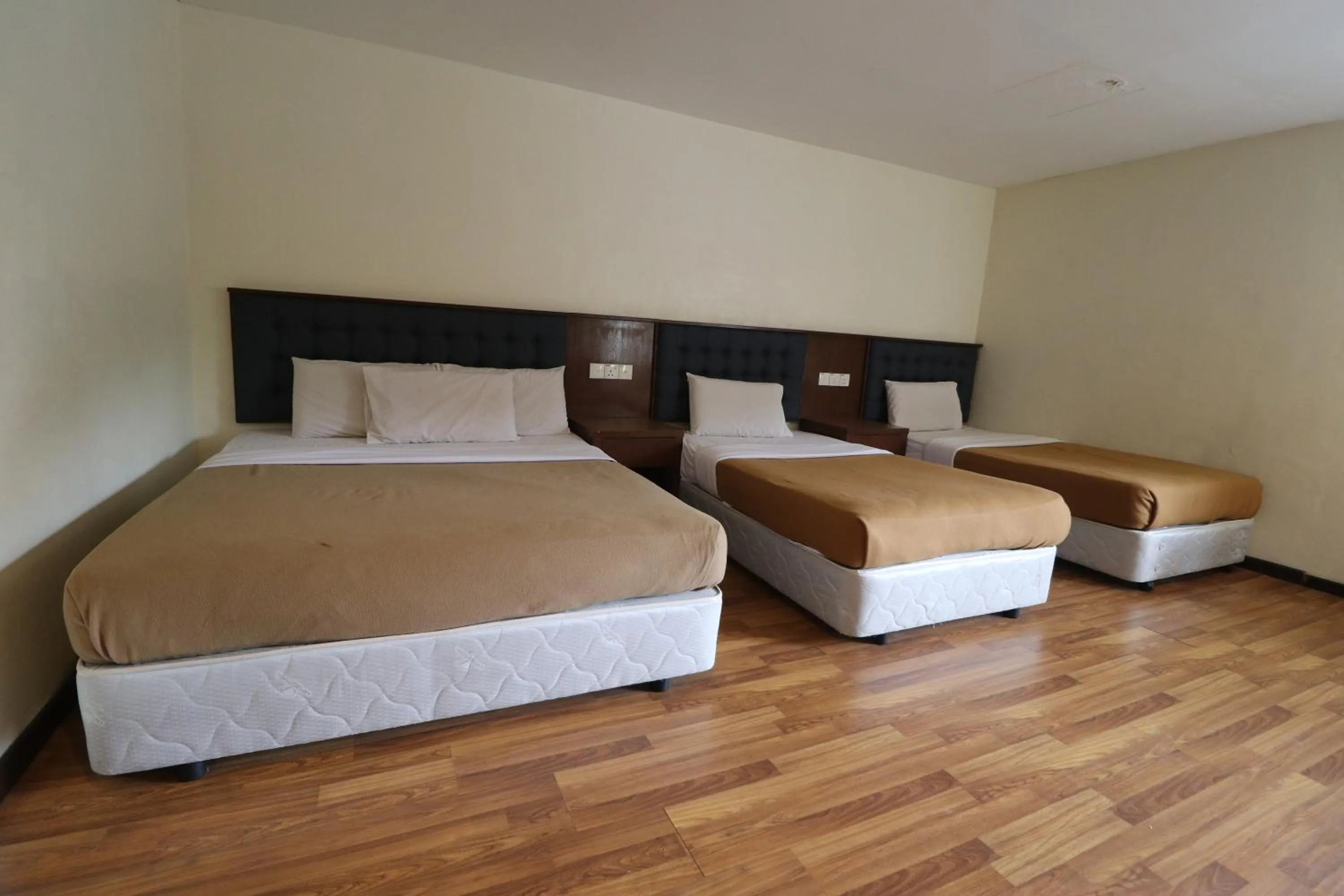 Bed in Iris House Hotel Cameron Highlands