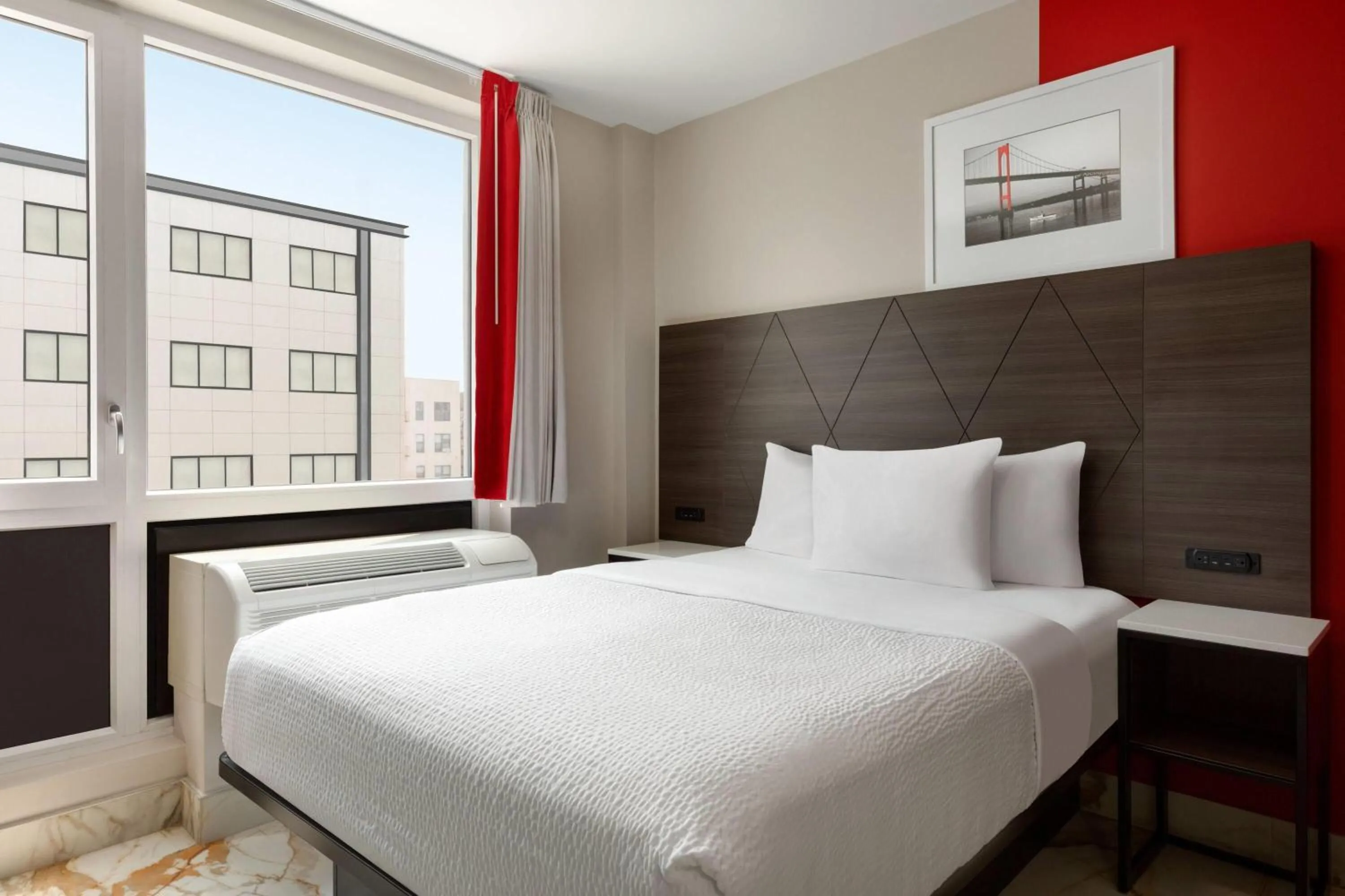 Photo of the whole room, Bed in Ramada by Wyndham Brooklyn Empire Blvd