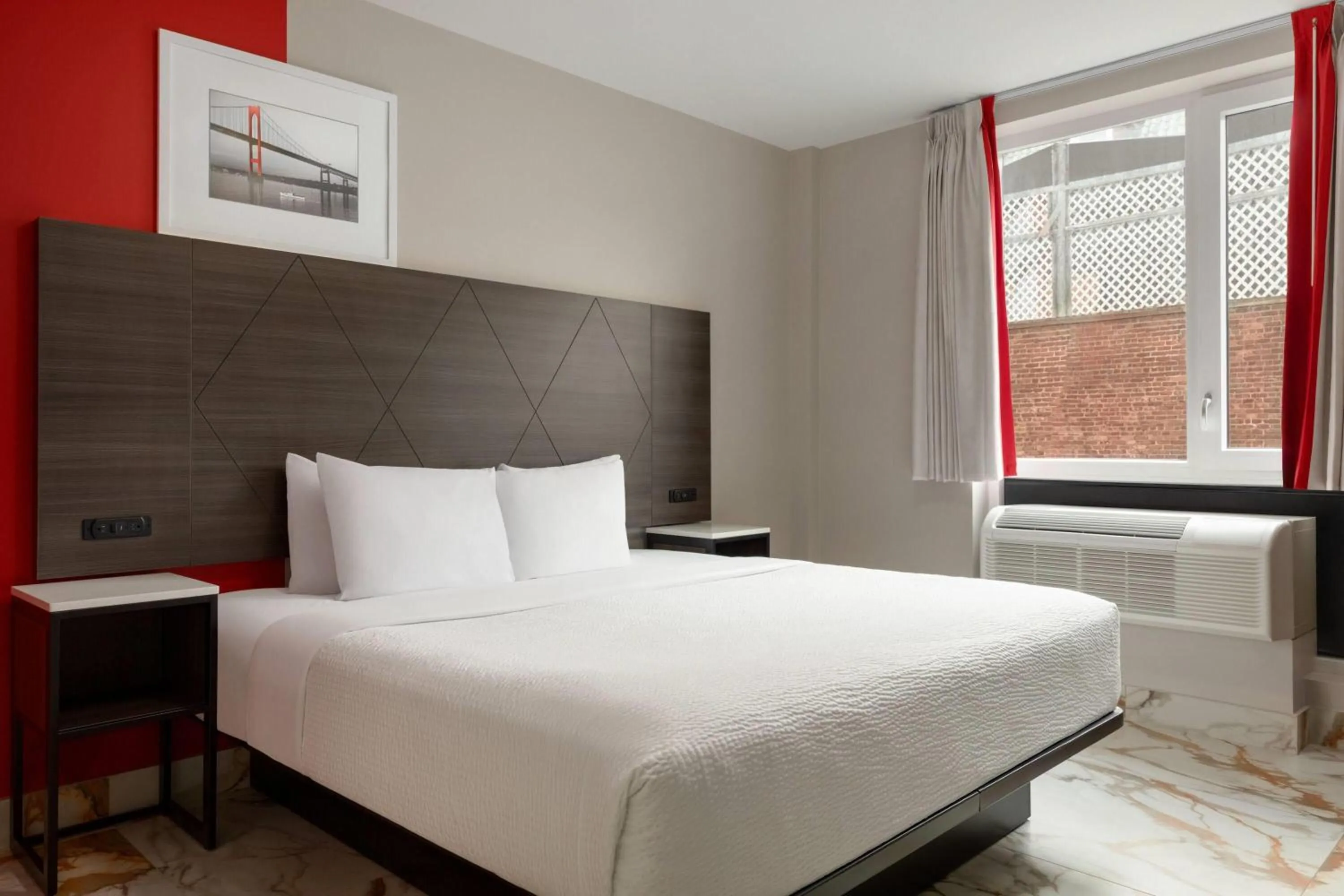 Photo of the whole room, Bed in Ramada by Wyndham Brooklyn Empire Blvd