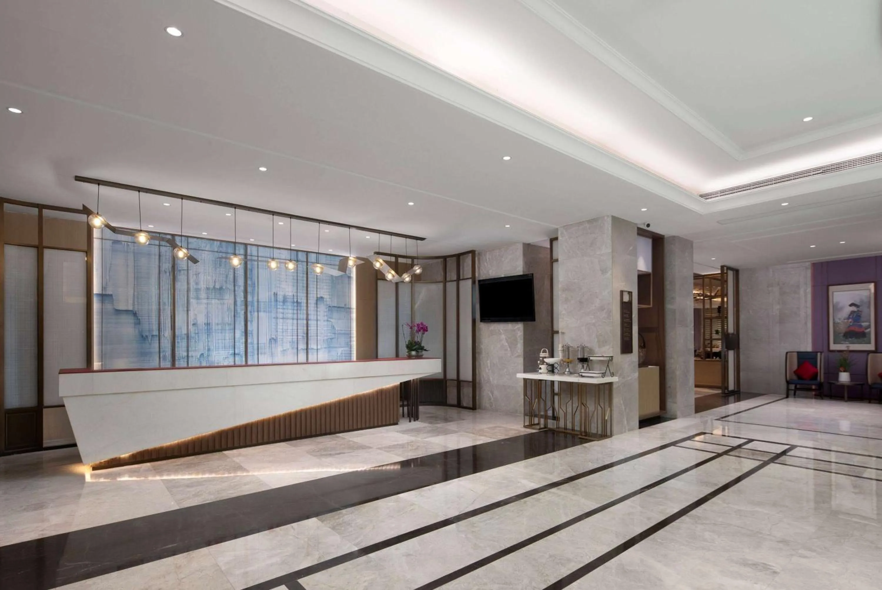 Lobby or reception in Ramada by Wyndham Zhumadian West Station