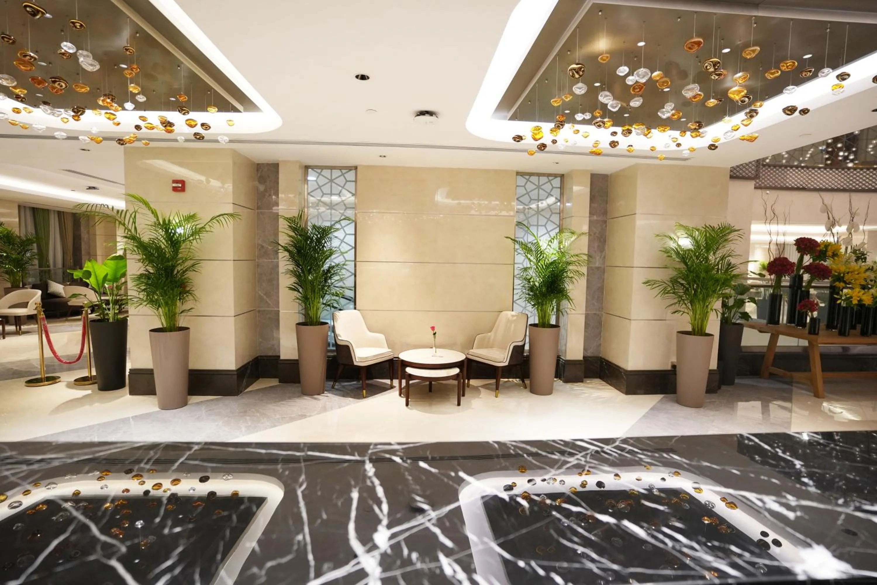 Lobby or reception in Peninsula Worth Hotel