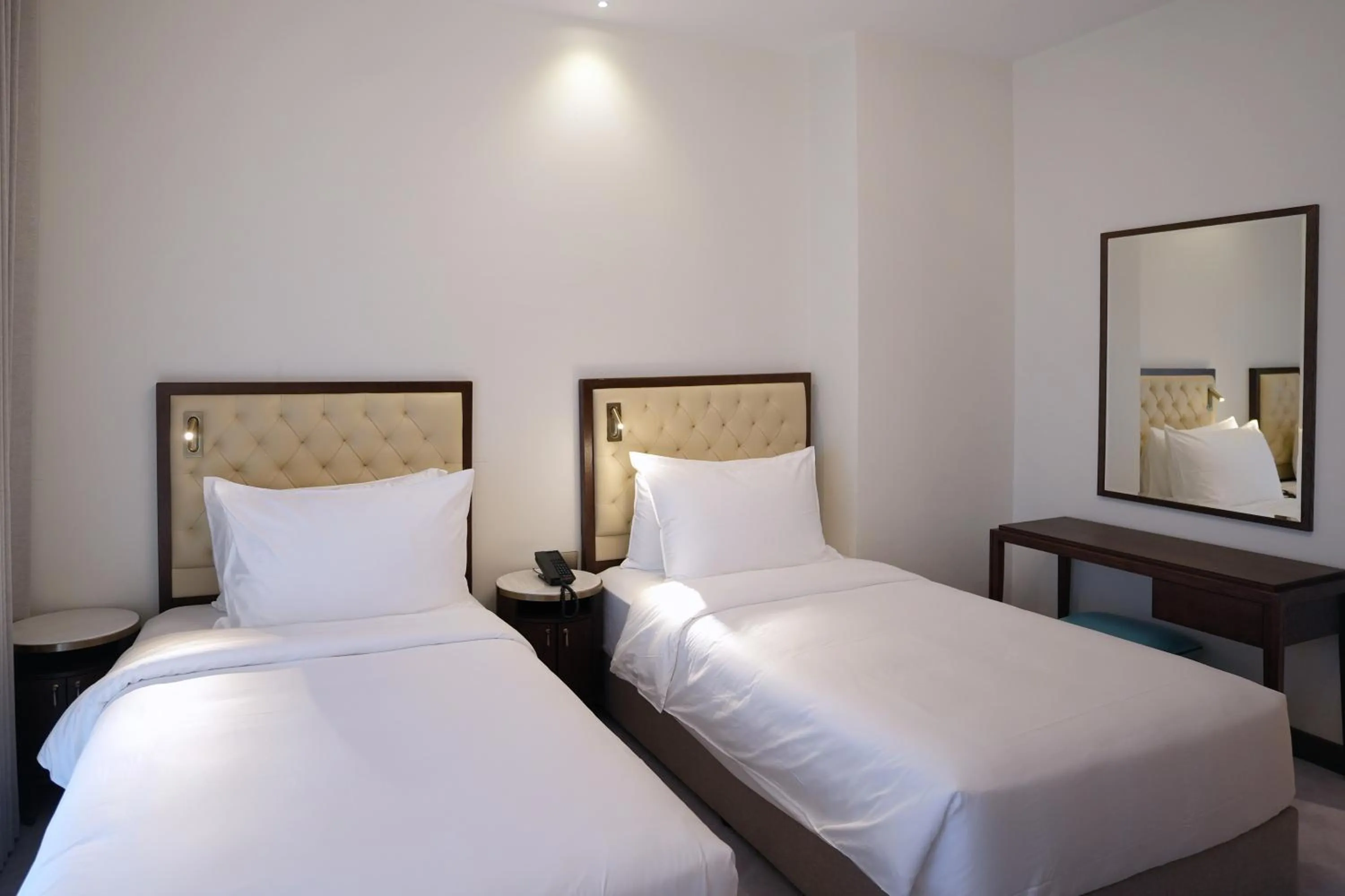 Bed in Peninsula Worth Hotel