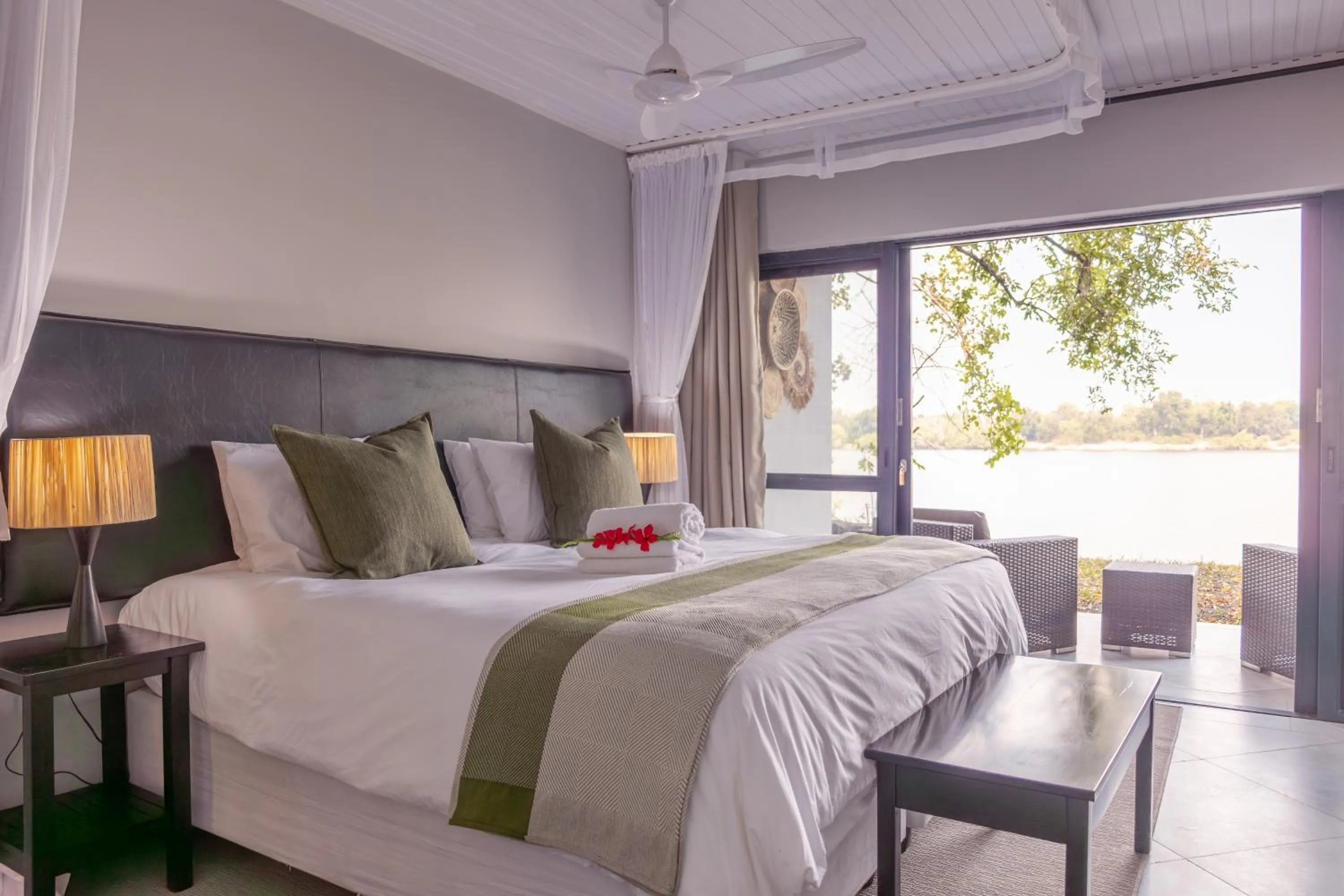Photo of the whole room, Bed in The Victoria Falls Waterfront