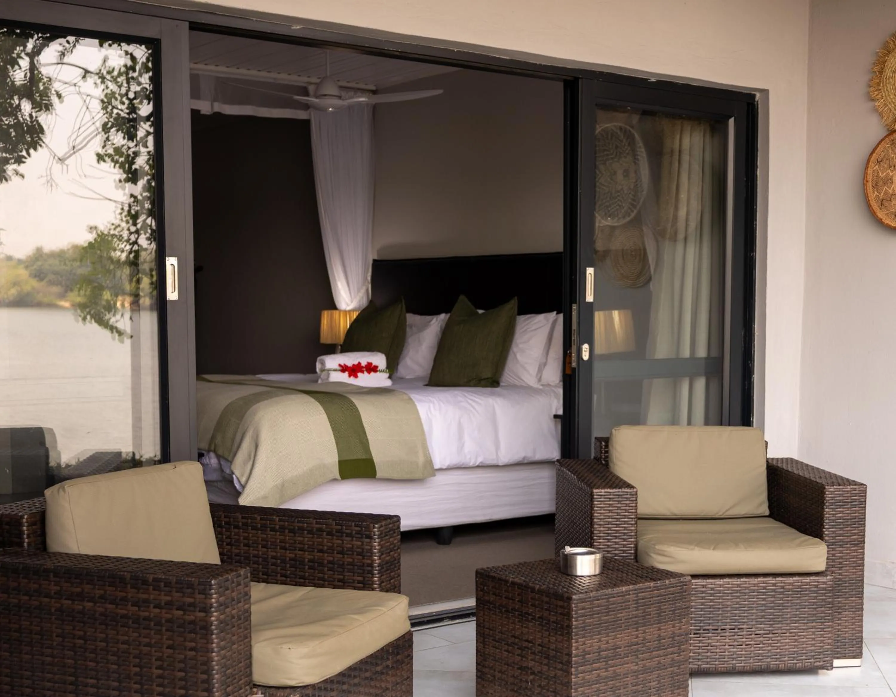 Seating area, Bed in The Victoria Falls Waterfront