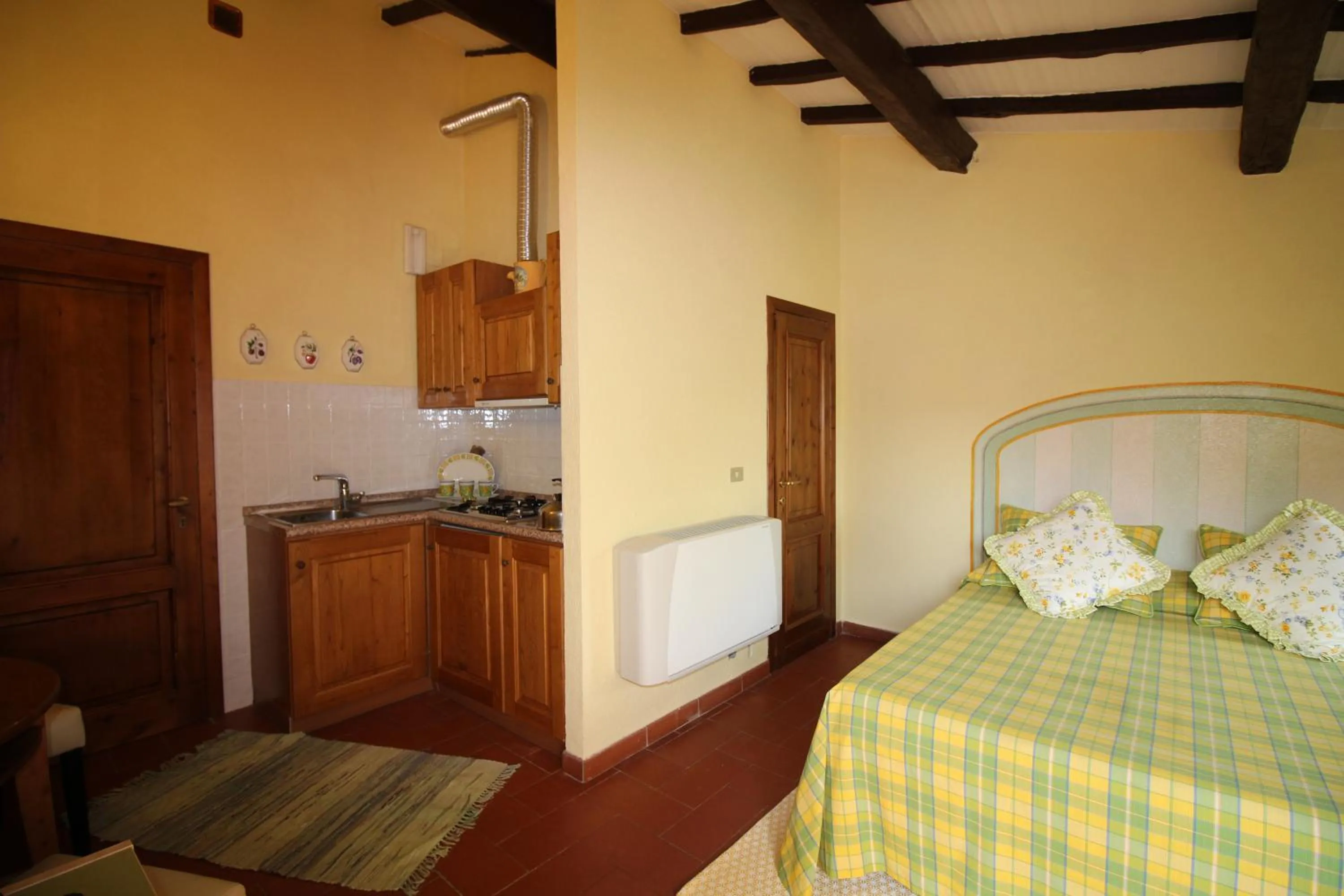 Kitchen or kitchenette, Bed in Casa Vacanze Casa Italia
