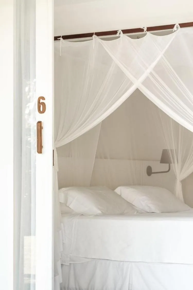 Bed in Pousada Brisas do Espelho