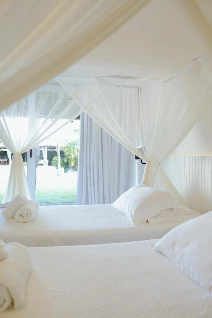 Bed in Pousada Brisas do Espelho