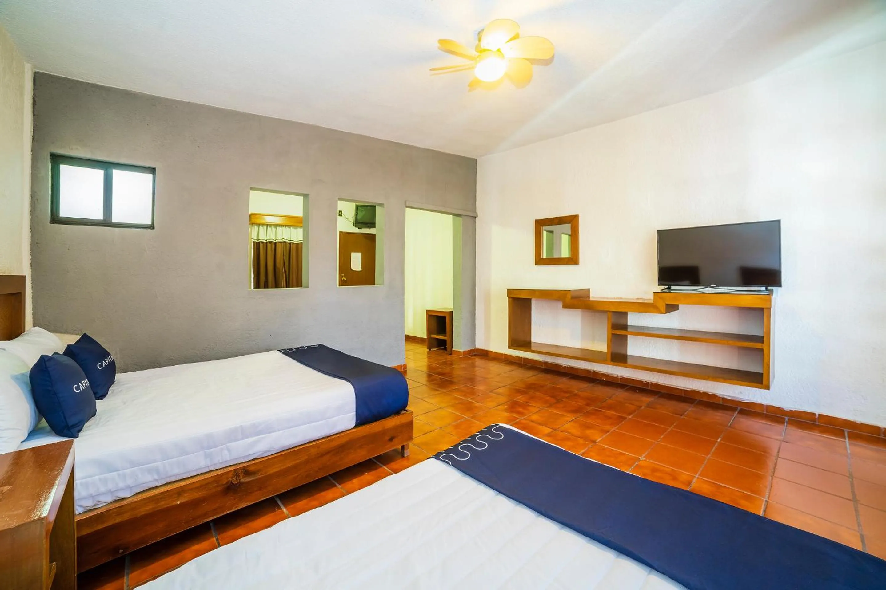 Bedroom, Bed in Capital O Hotel Casa Blanca