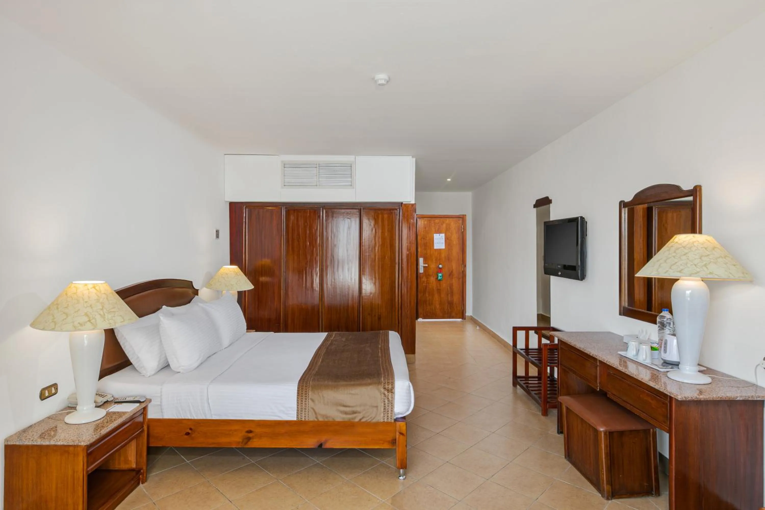 Bed in Marlin Inn Azur Resort