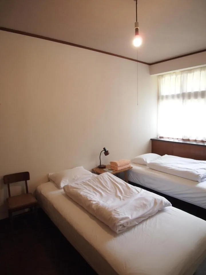 Bed in Yuzan Guesthouse