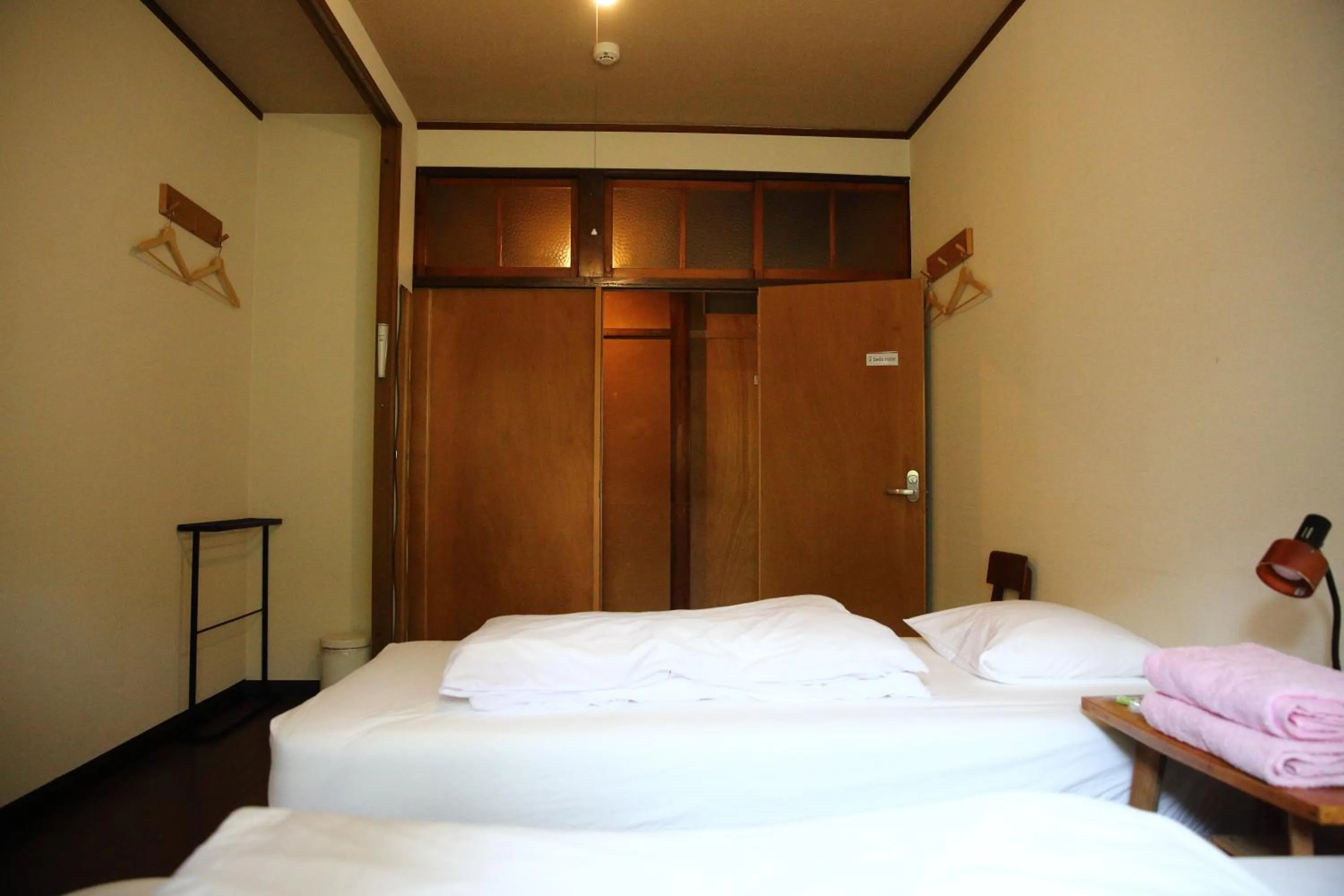 Bed in Yuzan Guesthouse