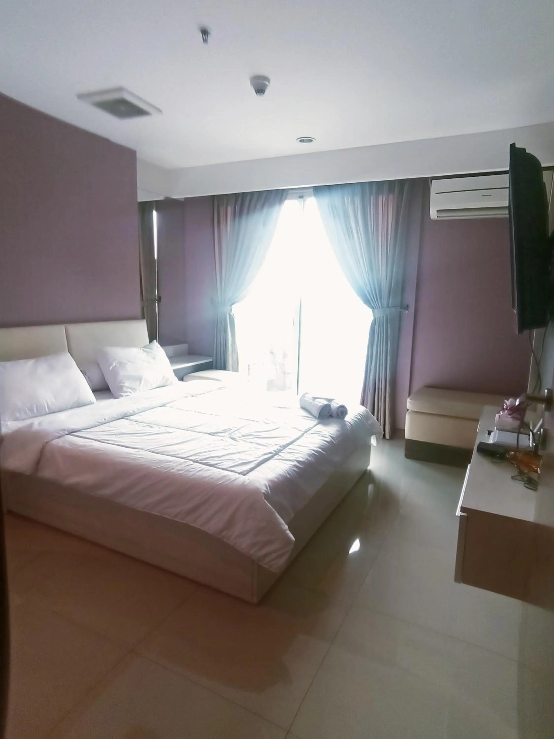 Bed in eL ROYALE by Farizi Rooms