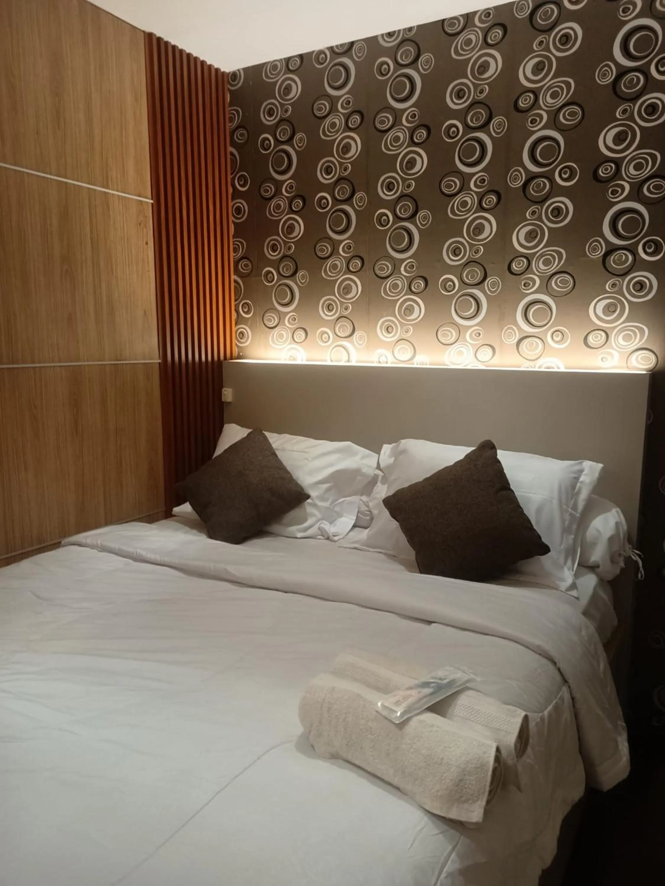 Bed in eL ROYALE by Farizi Rooms