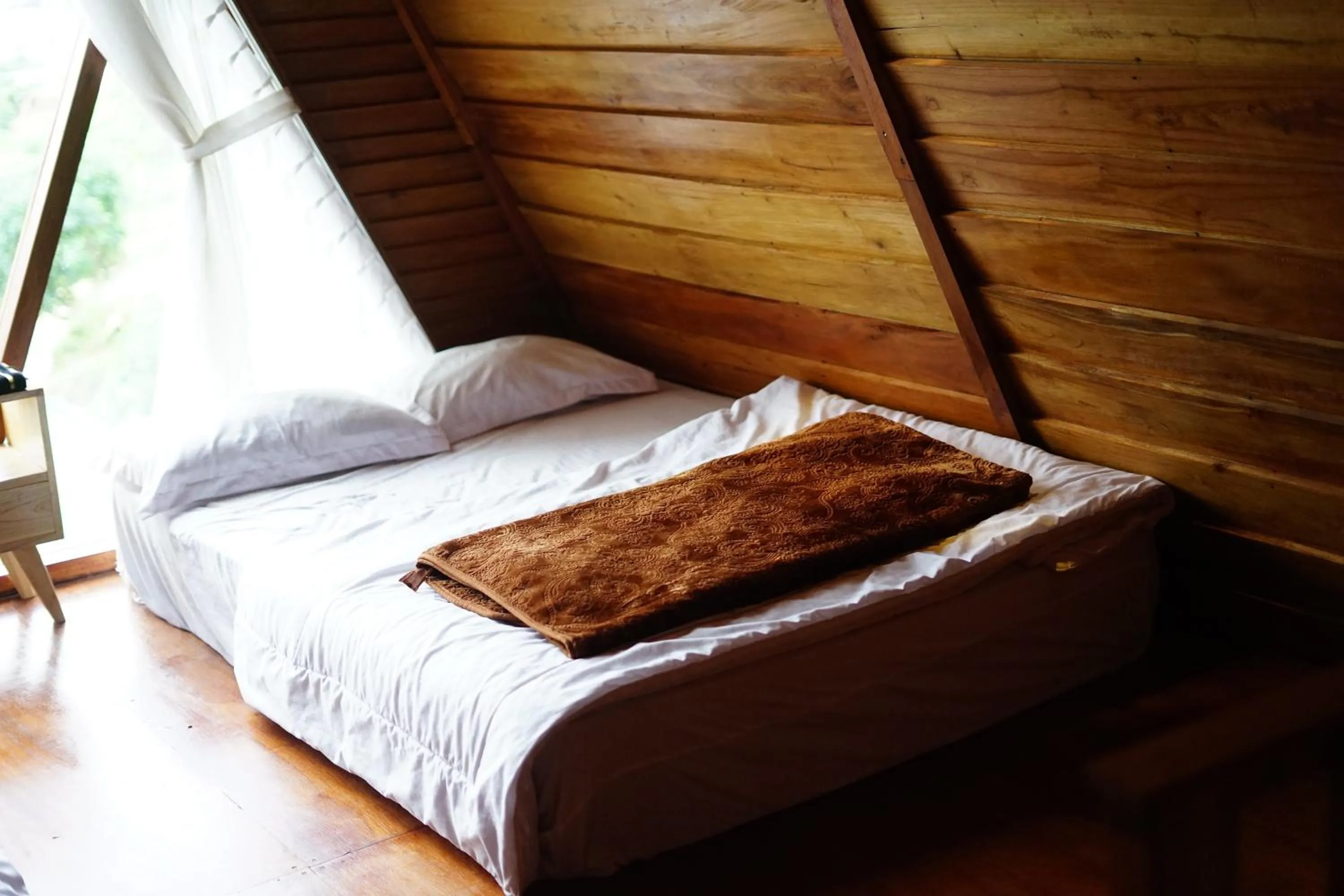 Bed in Savana Cabin by Fifa Grup