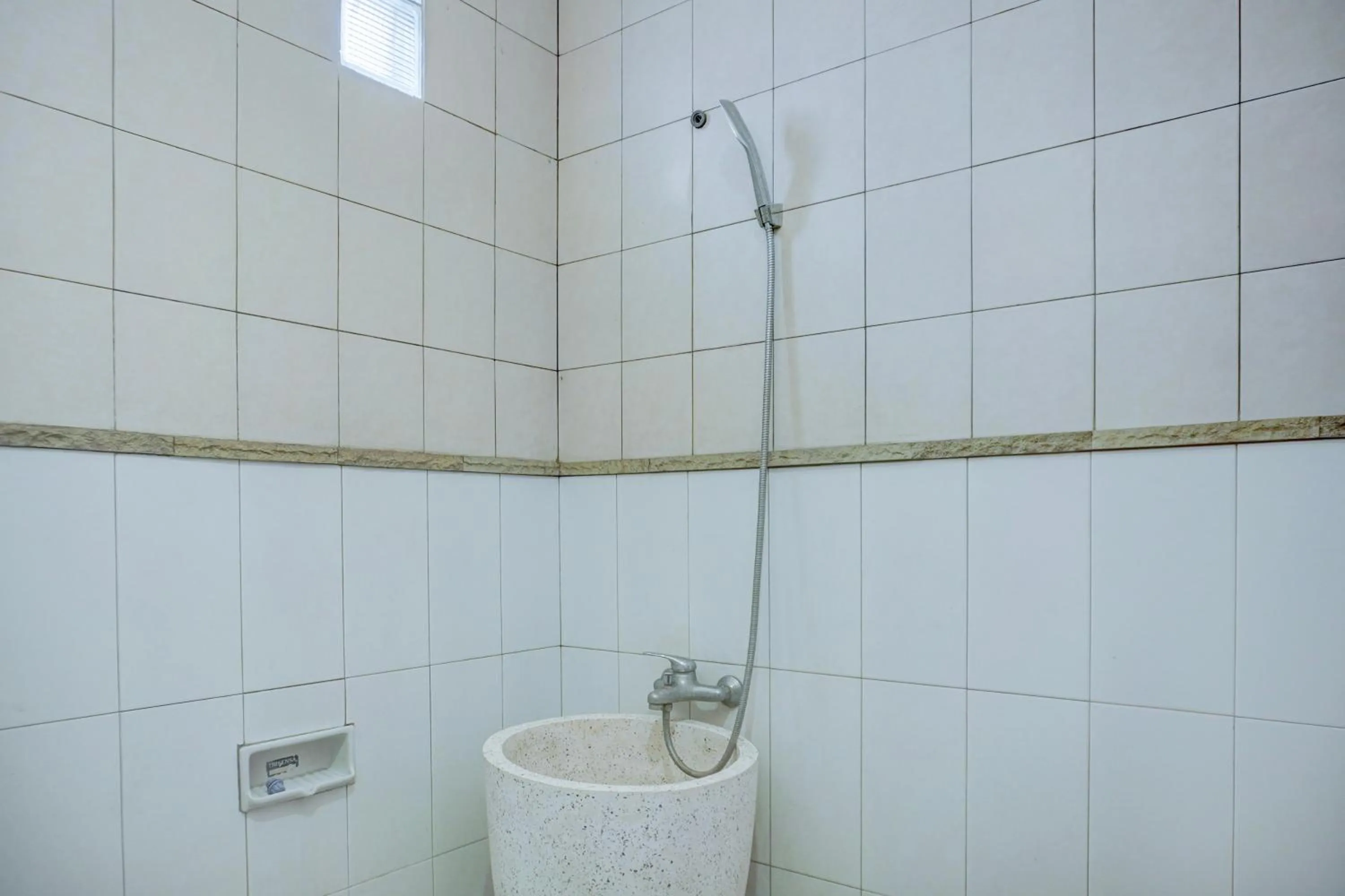 Bathroom in Collection O Pekalongan Near Pasar Batik Setono Formerly Hotel Jayadipa