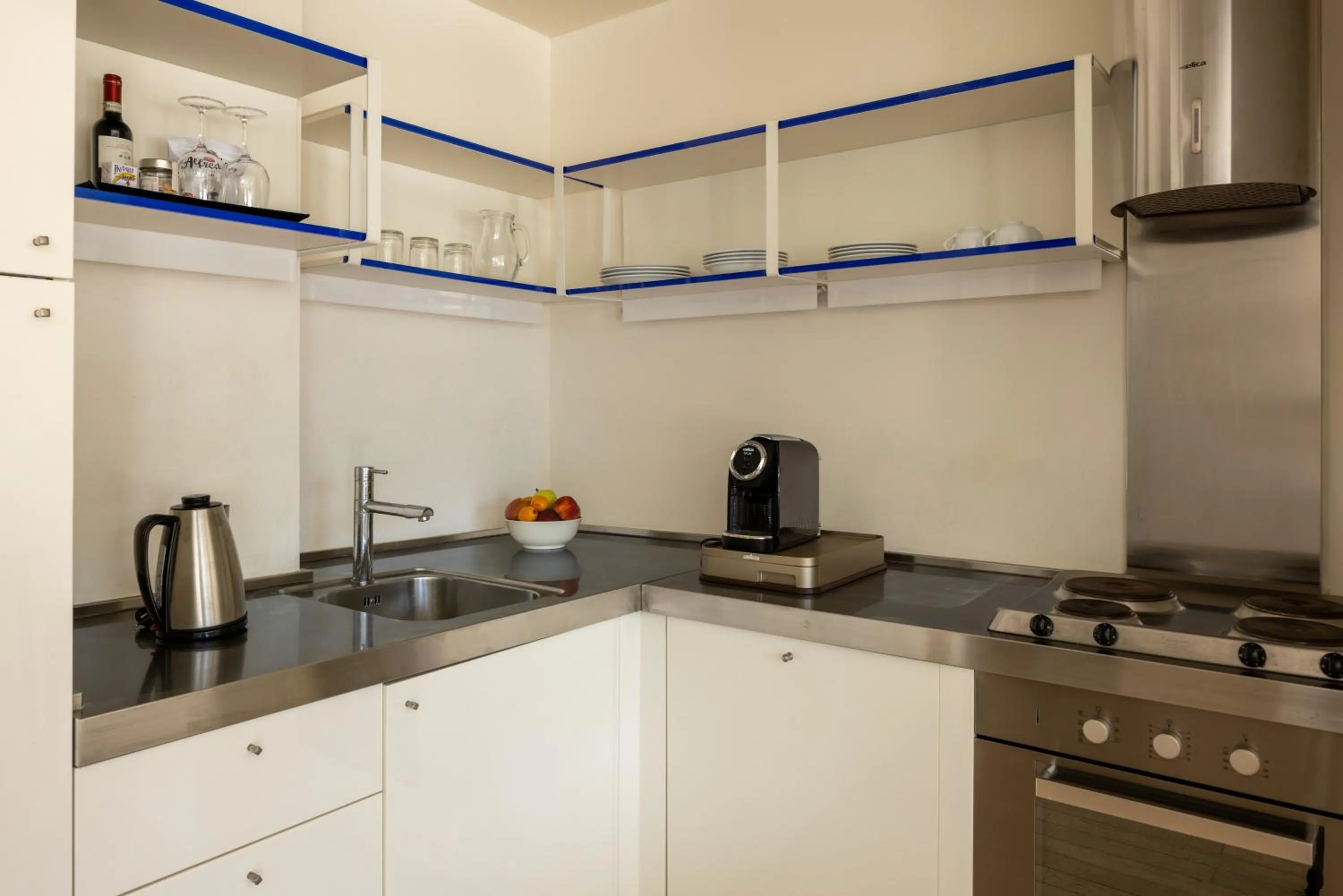 Kitchen or kitchenette in Versilia Lido | UNA Esperienze
