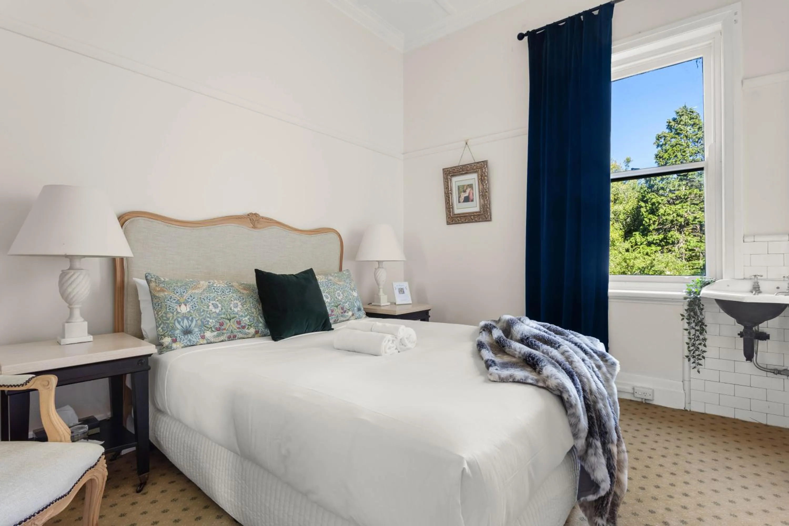 Bedroom in The Robertson Hotel