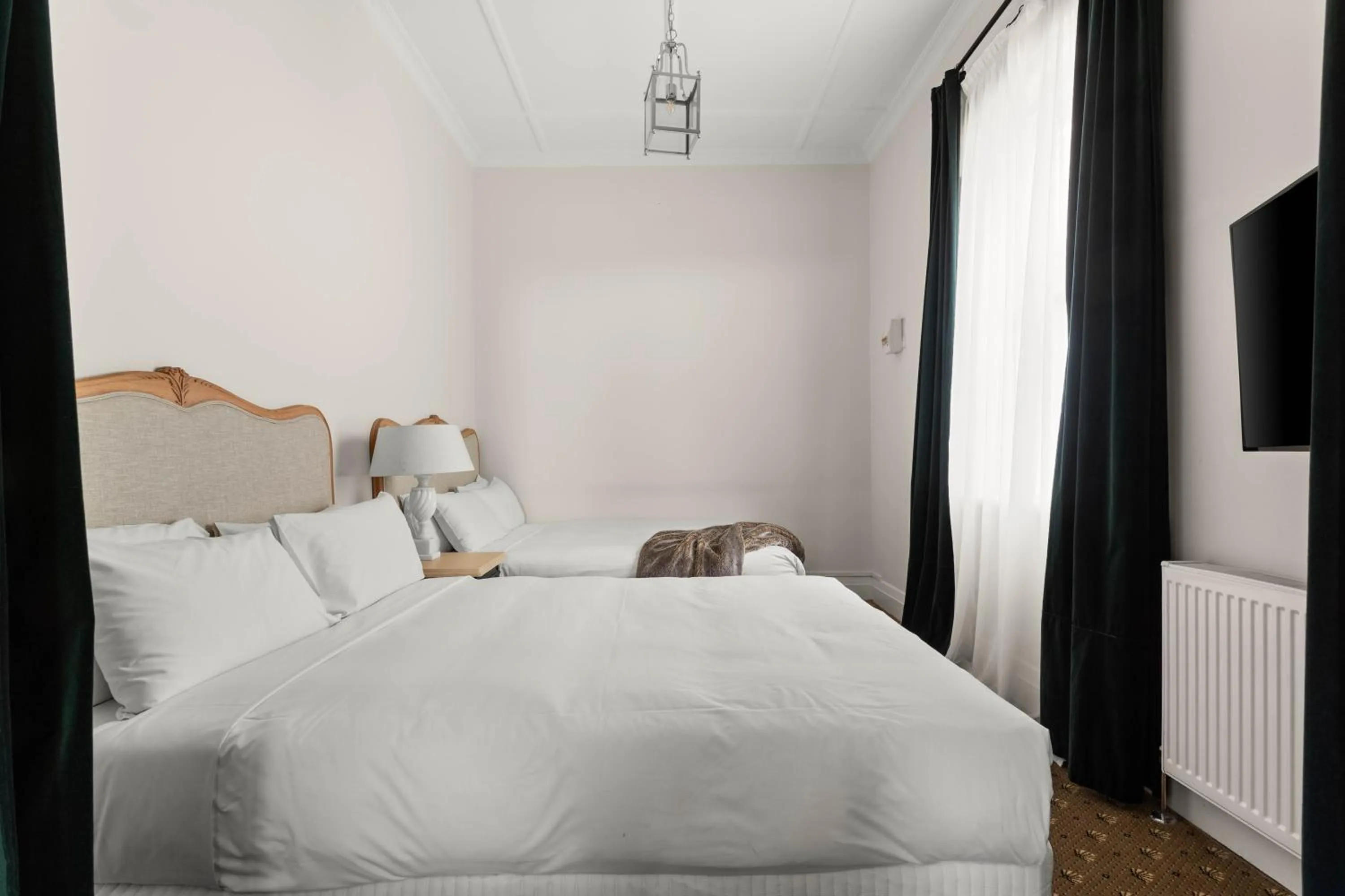 Bedroom in The Robertson Hotel