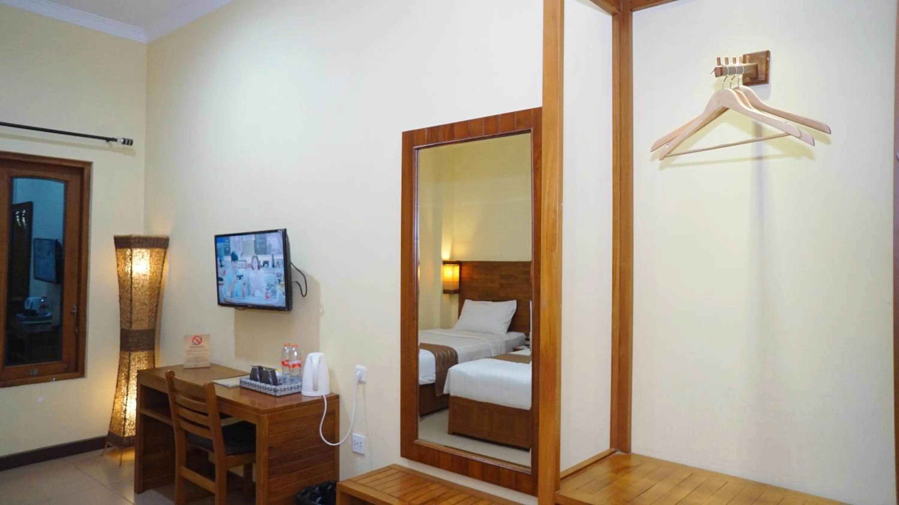 Bed in Syailendra Hotel Syariah