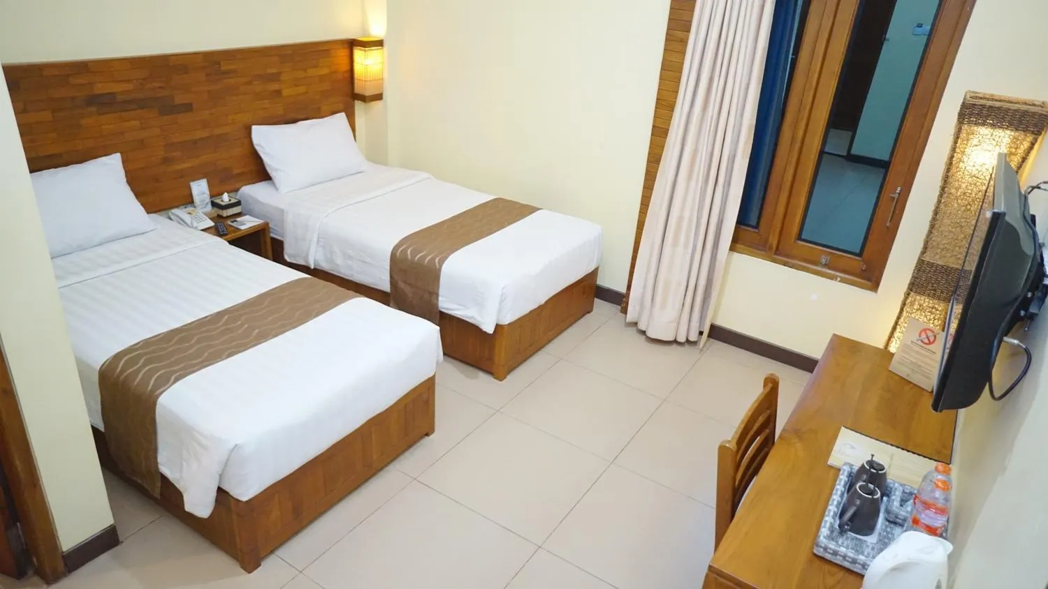 Bed in Syailendra Hotel Syariah