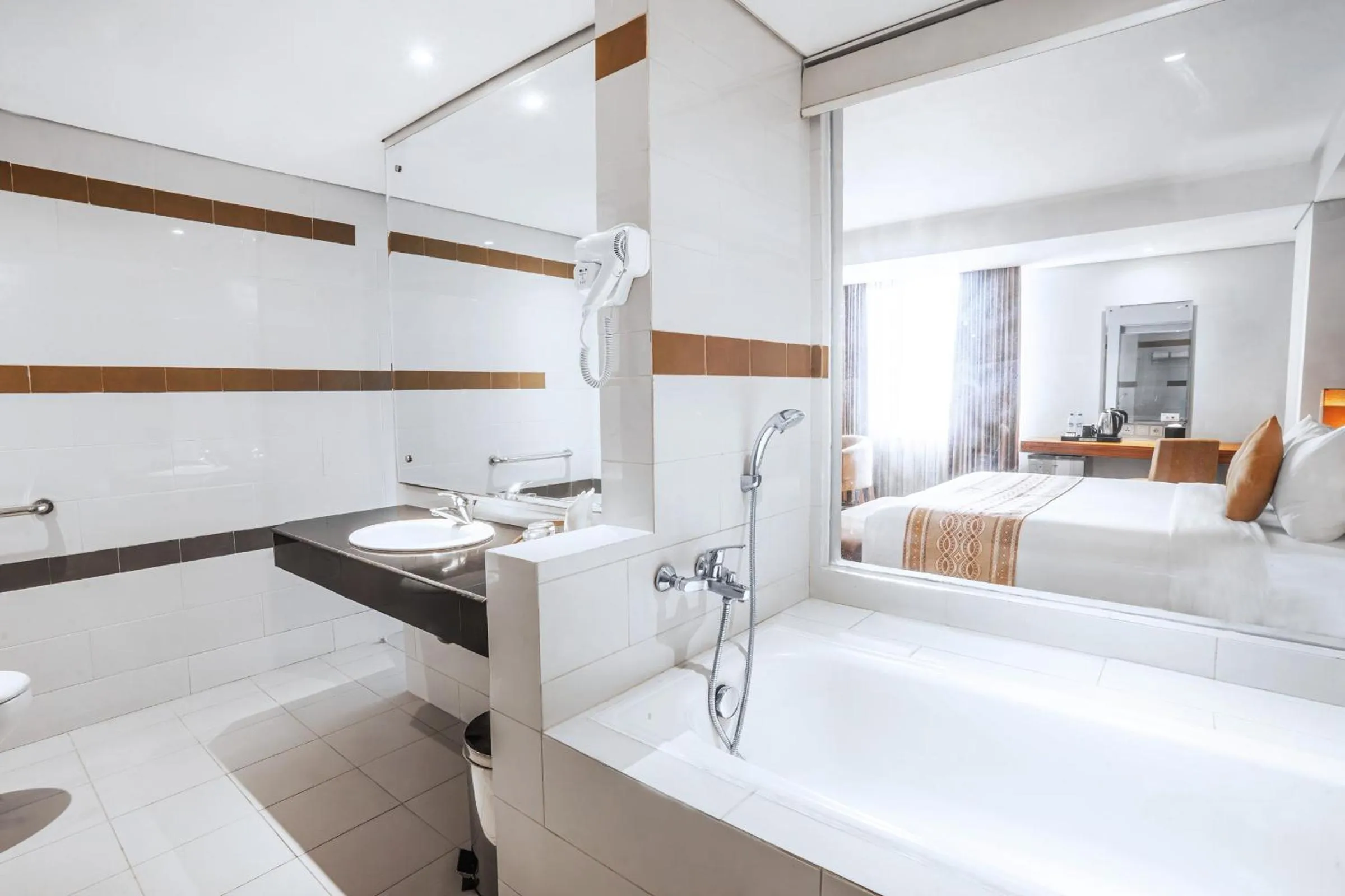 Bath, Bed in LAMORA Sagan Yogyakarta - formerly H Boutique Yogyakarta