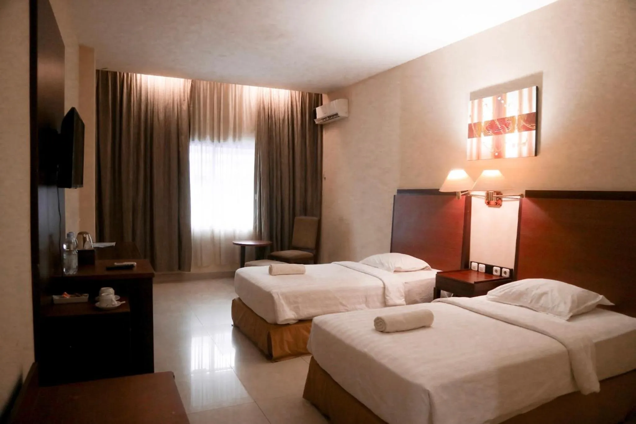 Bed in Hotel Mariat Sorong