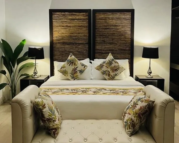 Bed in Lio Villas Resort
