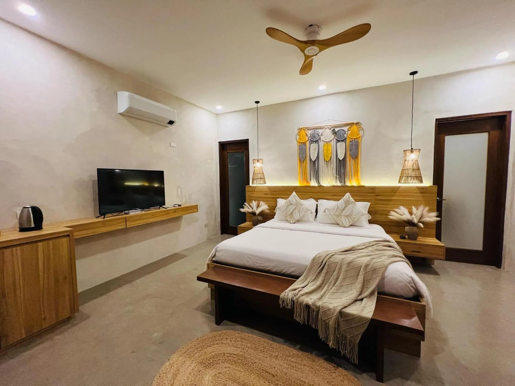 Bed in Lio Villas Resort