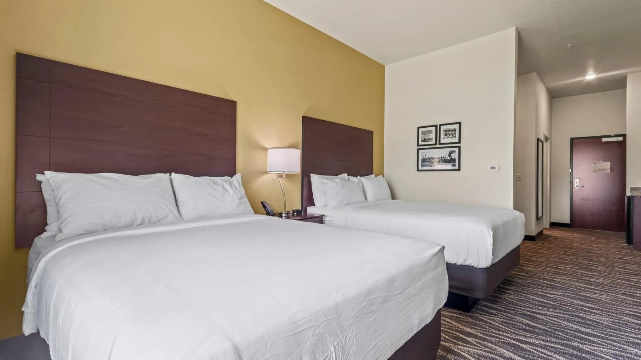 Bedroom, Bed in Cobblestone Hotel & Suites - Foley