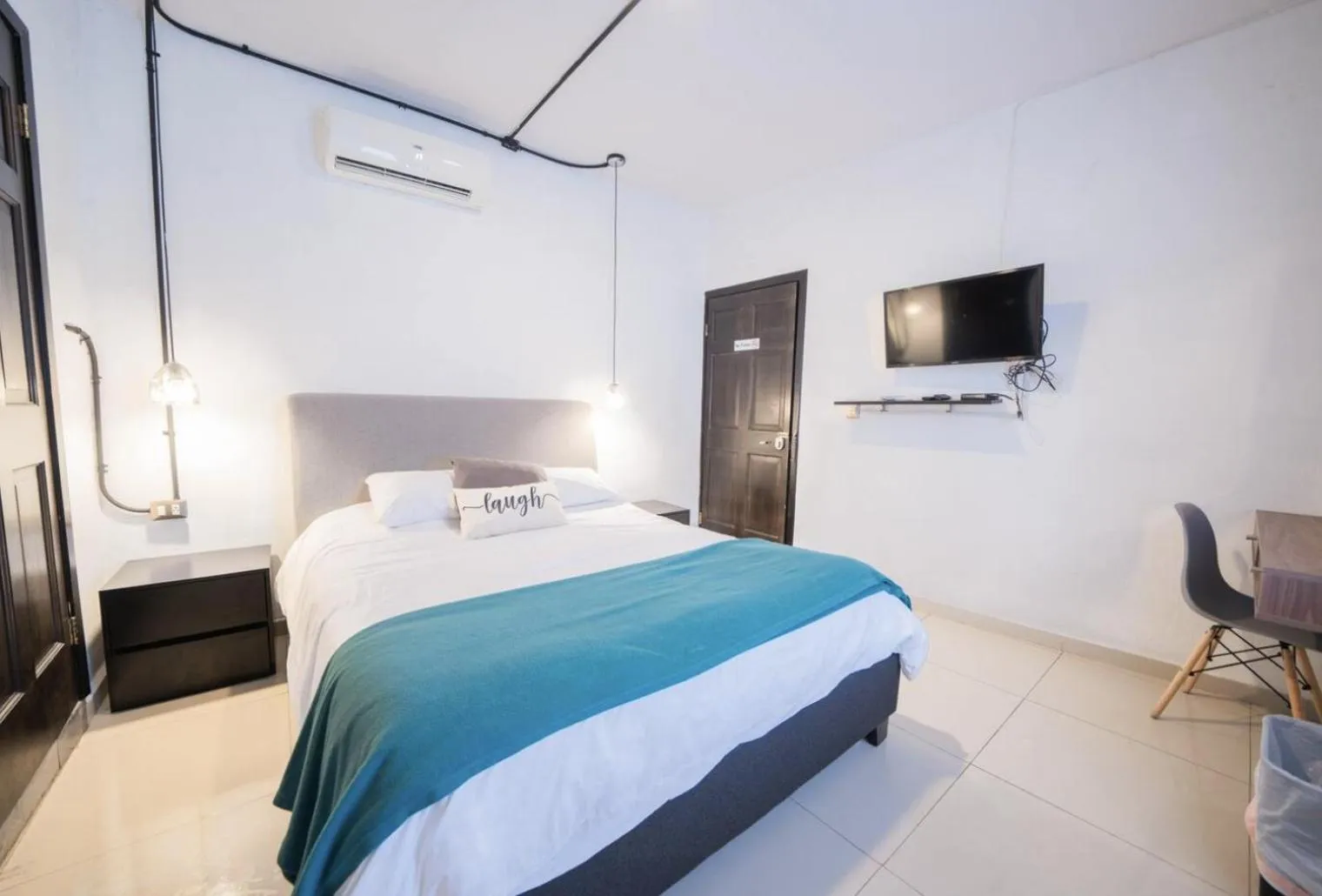 Bed in Adhoc Boutique Barrio Antiguo