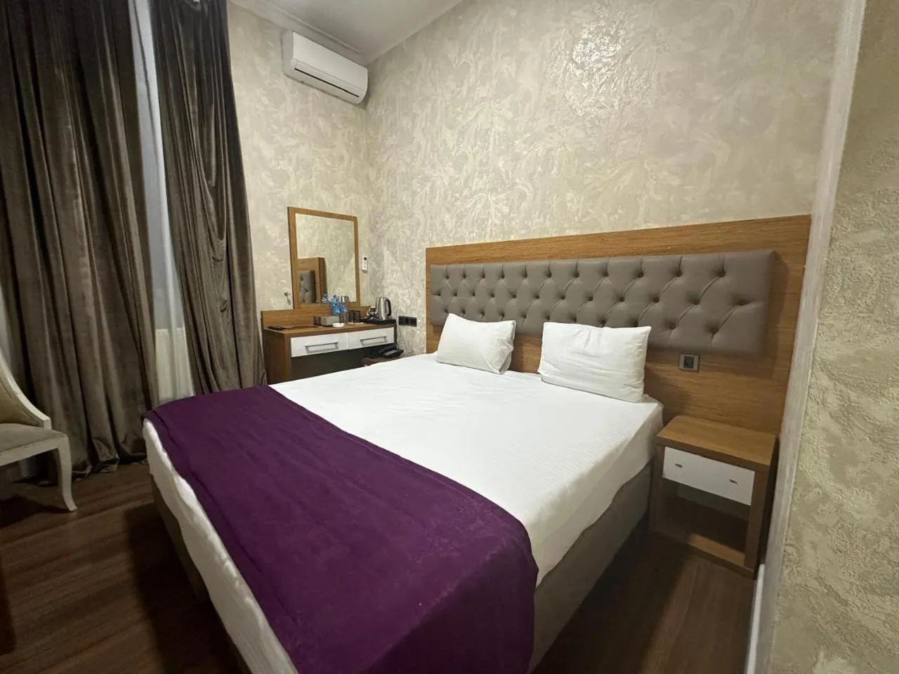 Bed in Hotel Empire Business Baku