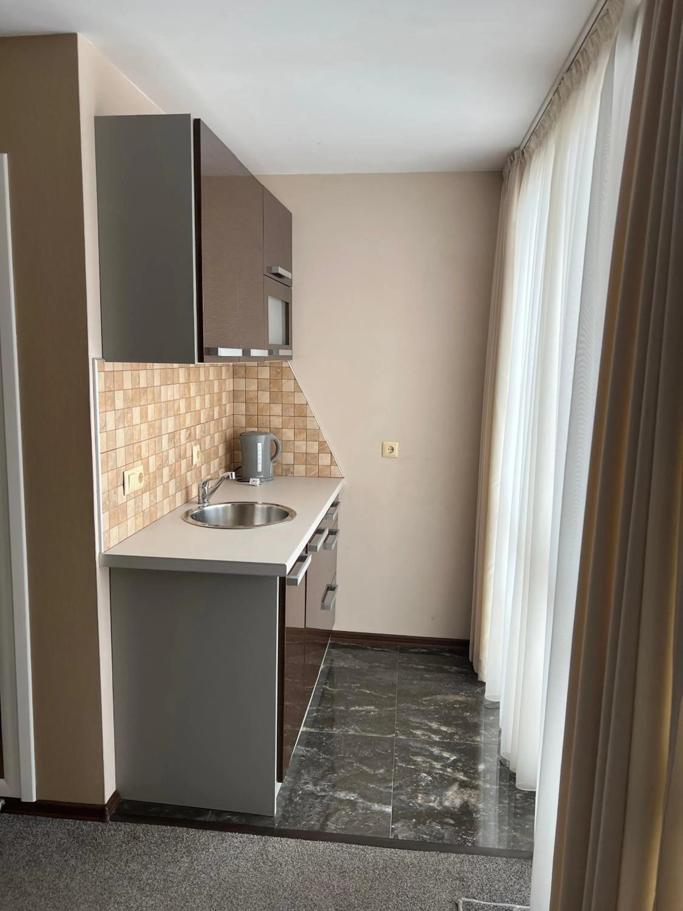 Kitchen or kitchenette in Hotel Lazur