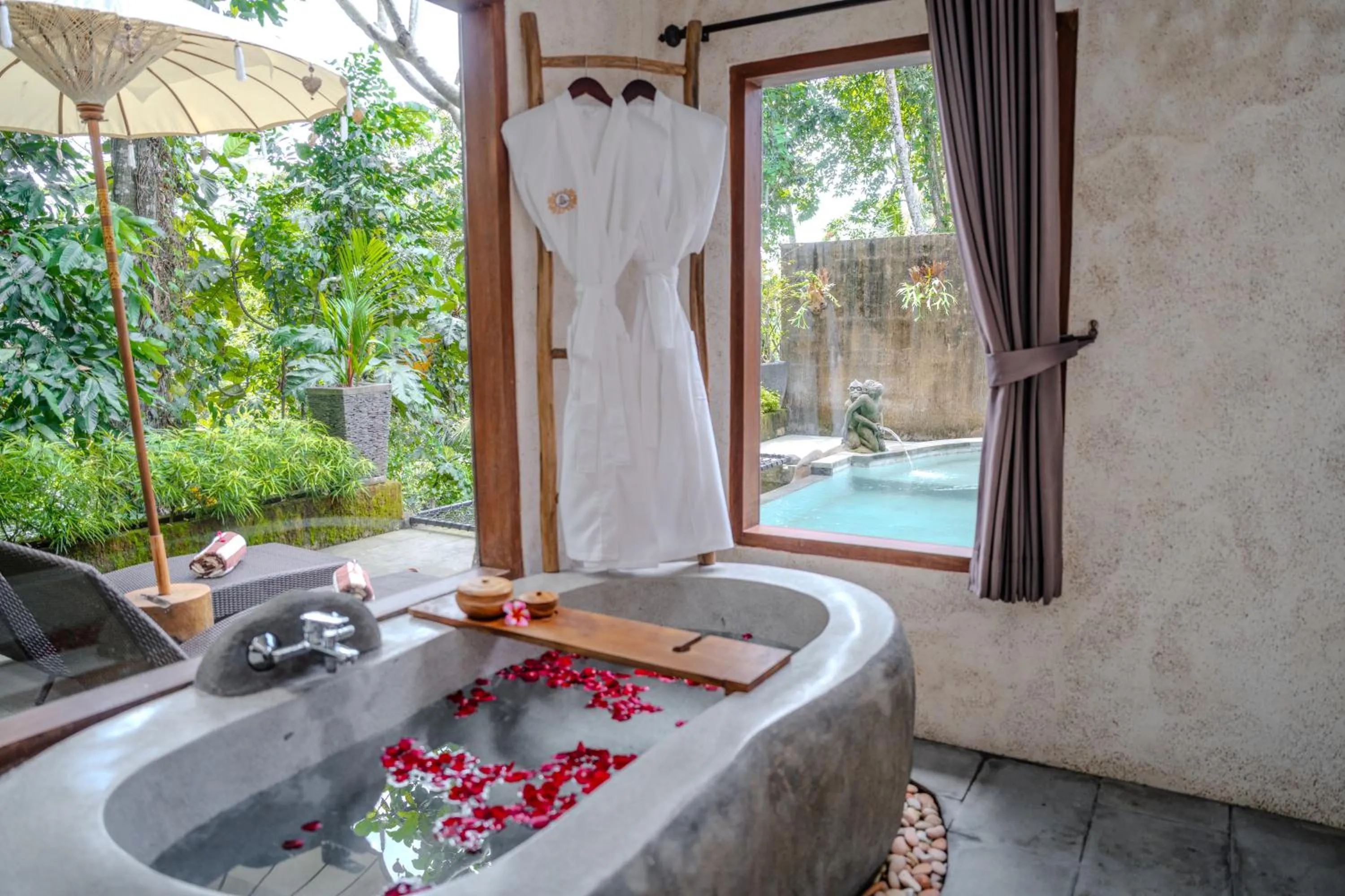 Bathroom in Hoshi Jungle Resort by Dhananjaya Hospitality