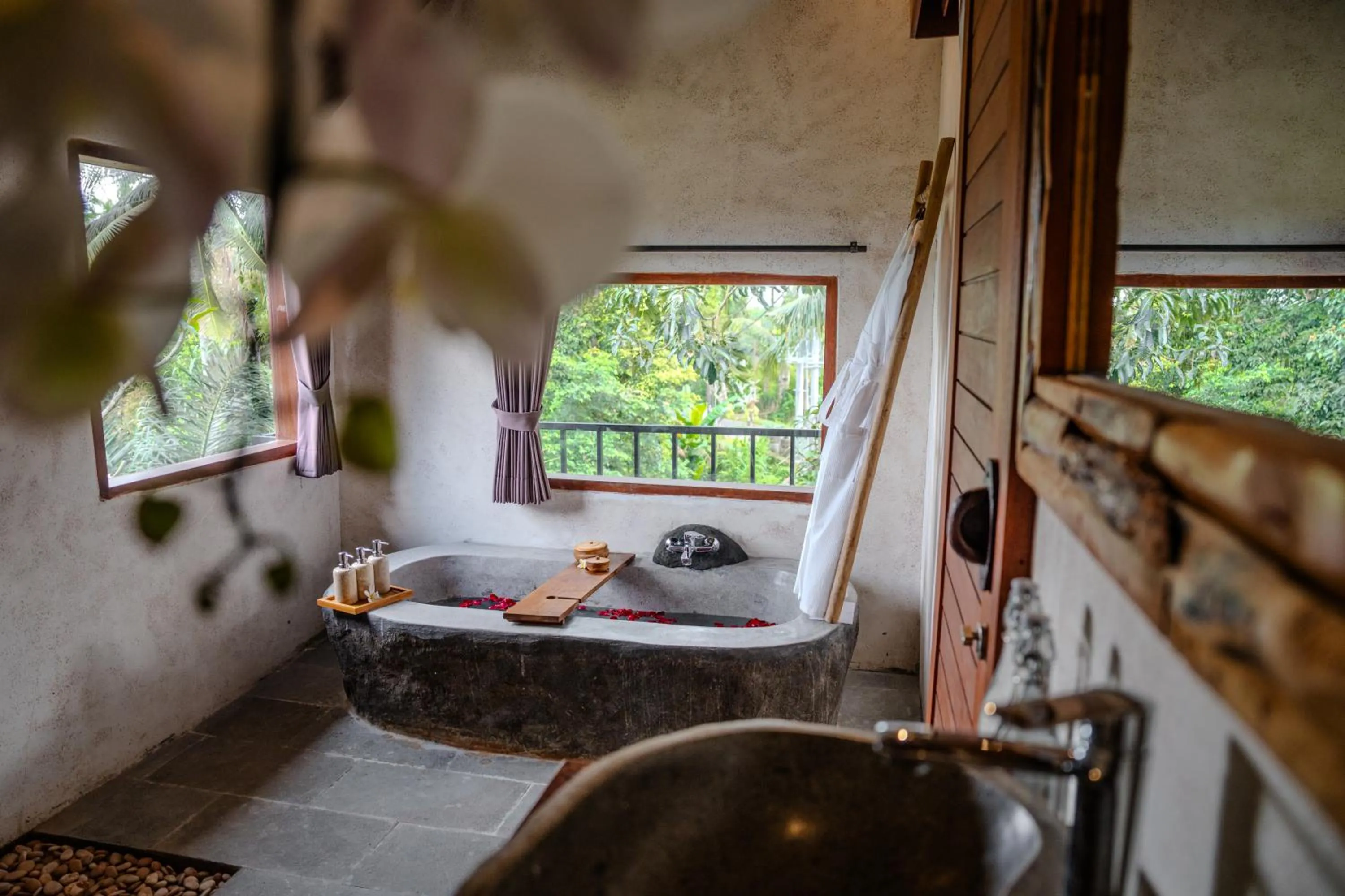 Bathroom in Hoshi Jungle Resort by Dhananjaya Hospitality