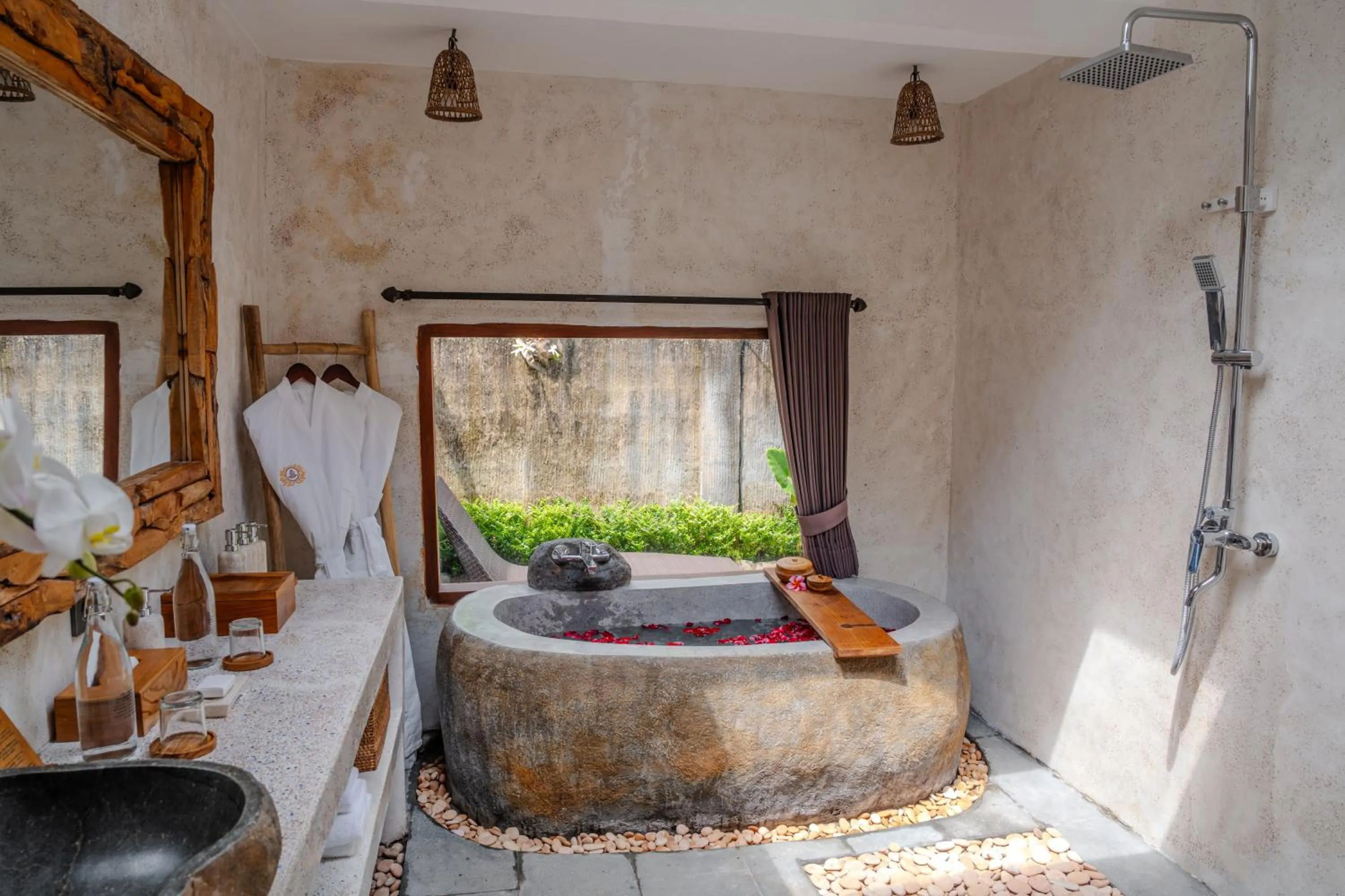 Bathroom in Hoshi Jungle Resort by Dhananjaya Hospitality